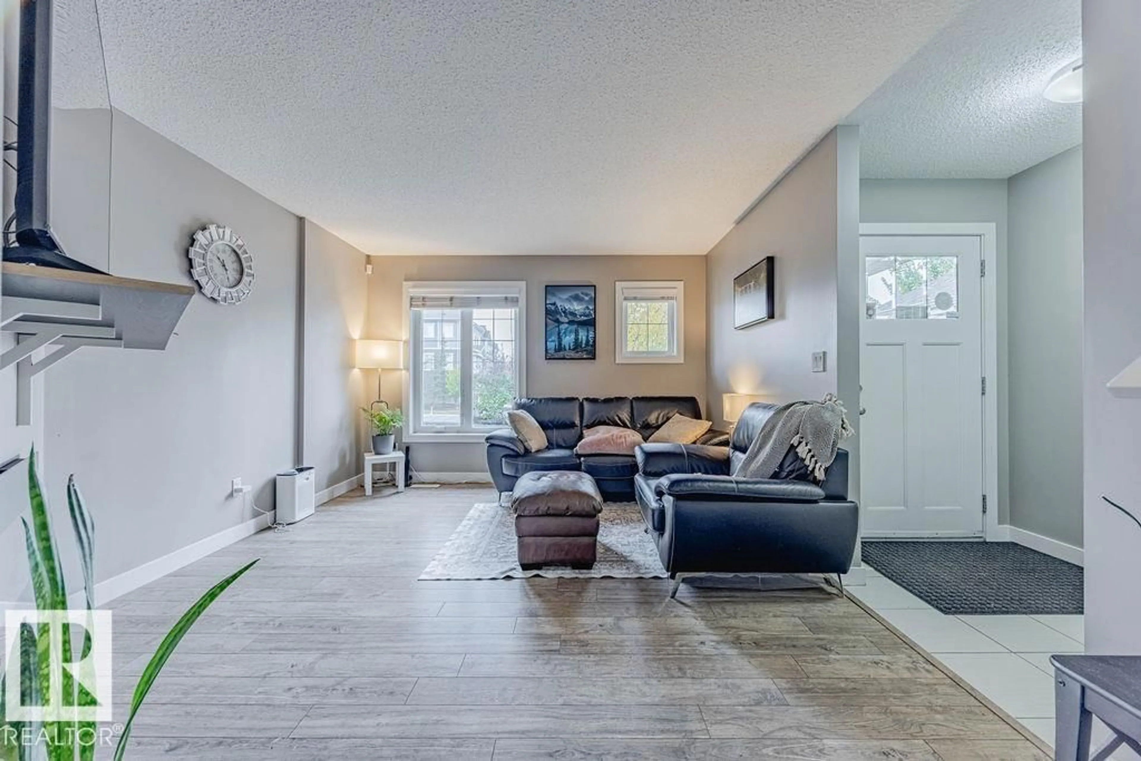 Living room with furniture, unknown for 7386 EDGEMONT WY, Edmonton Alberta T6M0P4