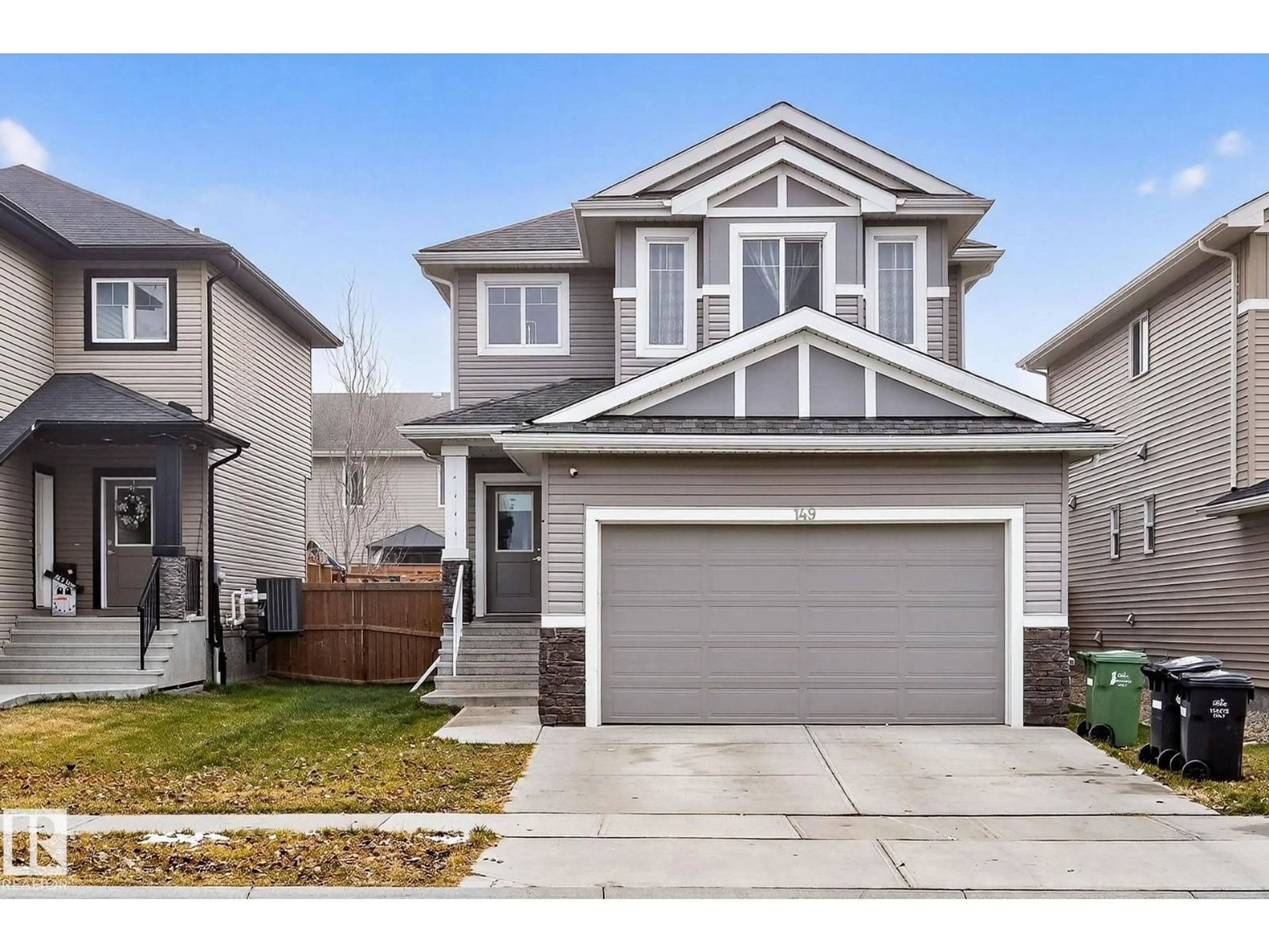 Home with vinyl exterior material, street for 149 AWENTIA ST, Leduc Alberta T9E1H4