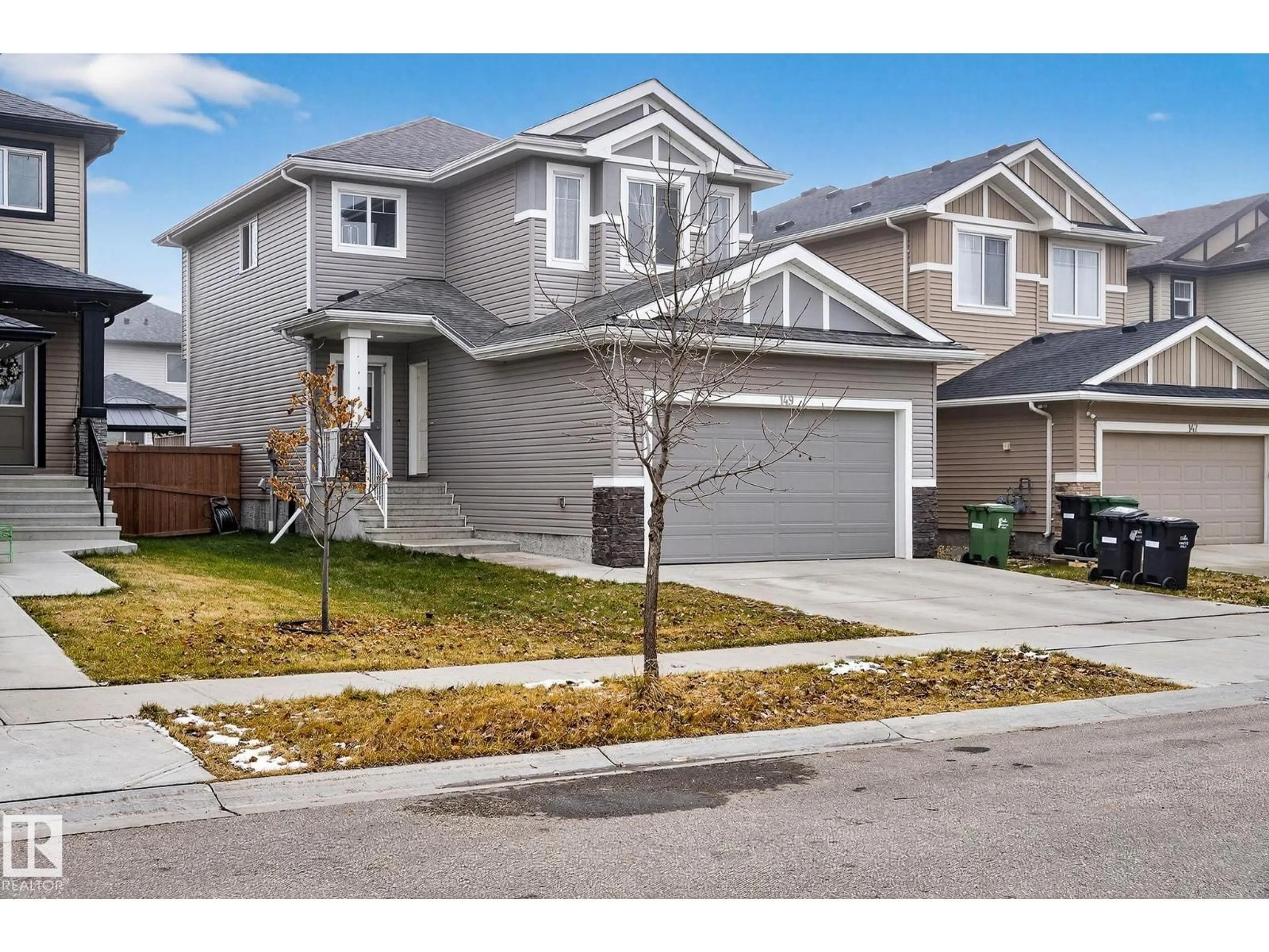Home with vinyl exterior material, street for 149 AWENTIA ST, Leduc Alberta T9E1H4