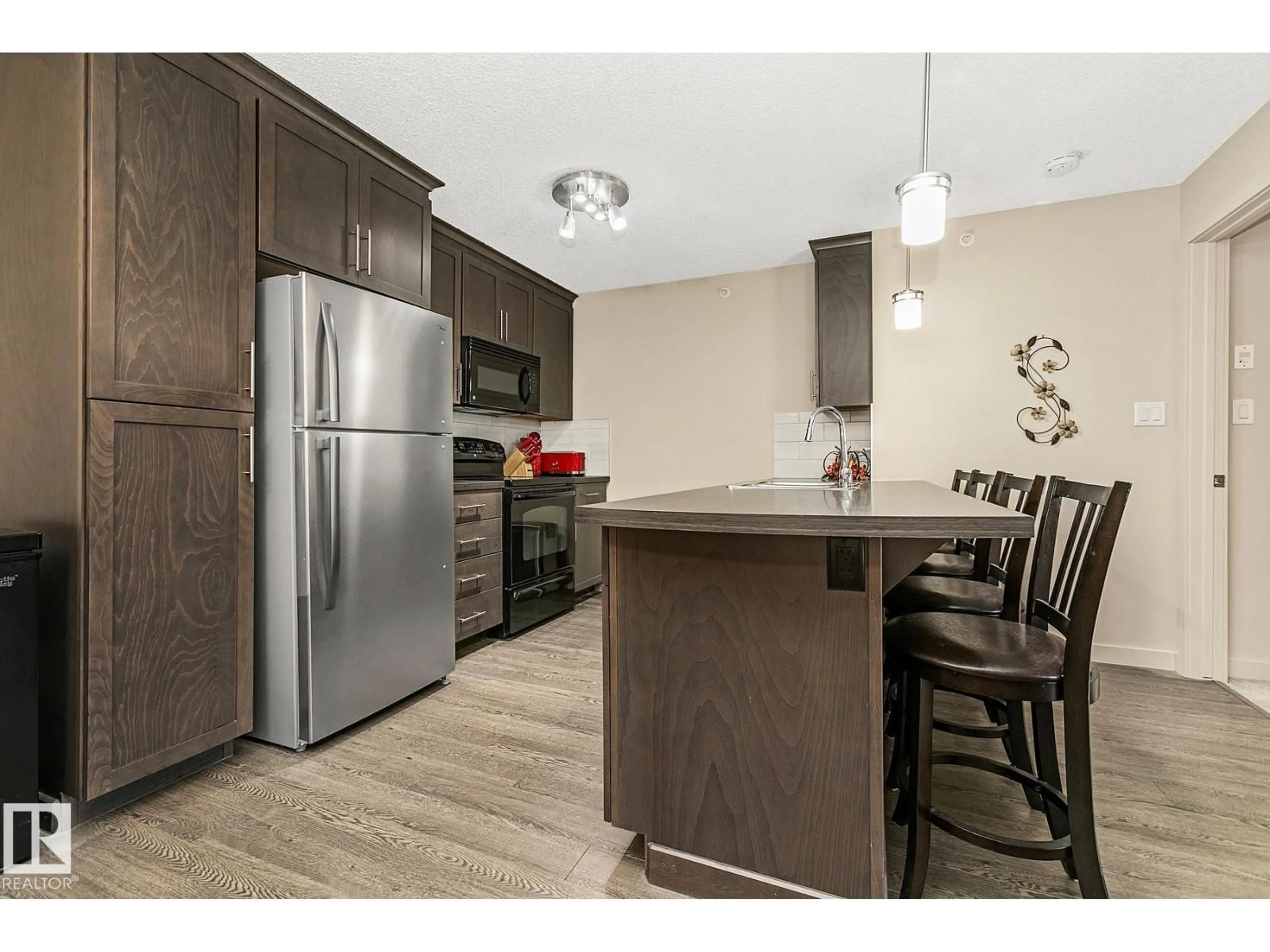 Standard kitchen, wood/laminate floor for #413 - 6084 STANTON DR, Edmonton Alberta T6X0Z4