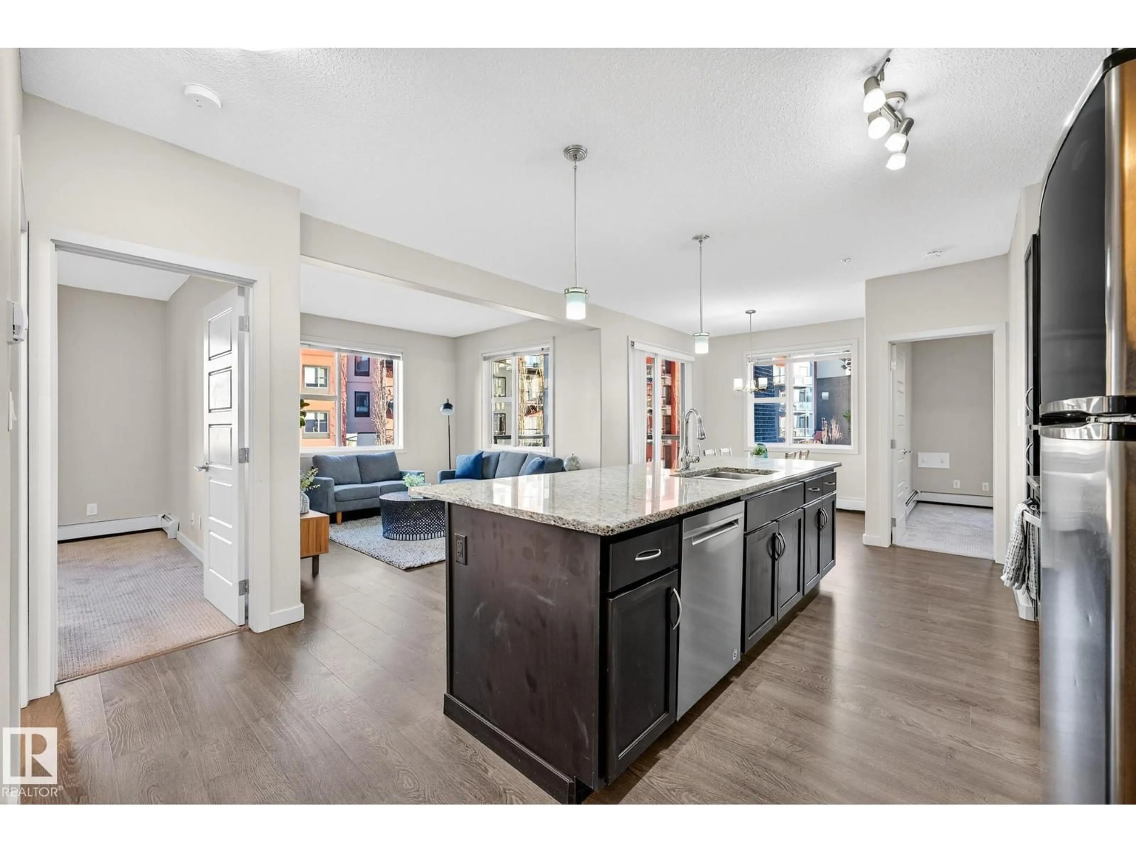 Open concept kitchen, unknown for 308 - 247 AMBLESIDE LINK LI, Edmonton Alberta T6W0V3