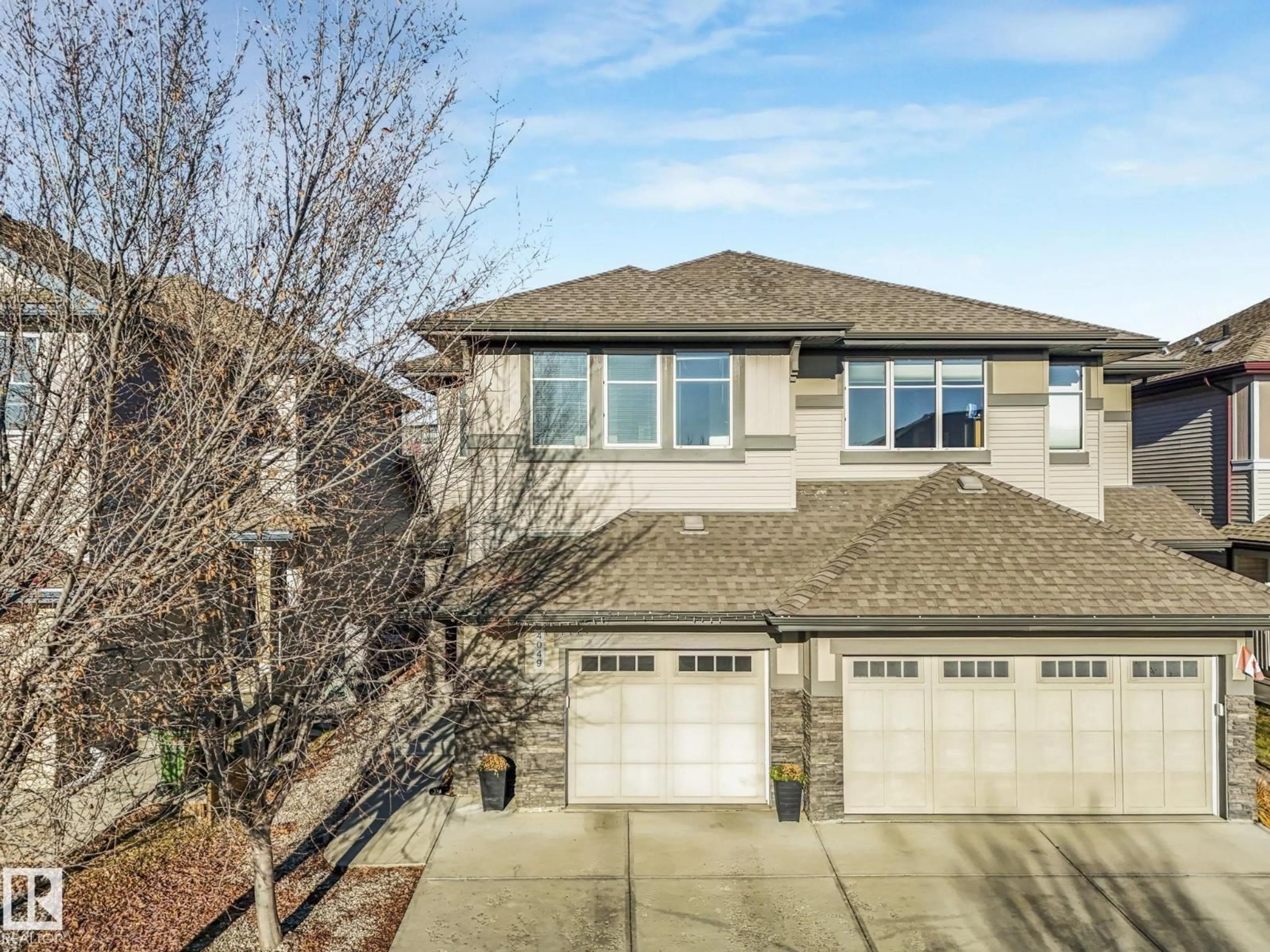 Home with brick exterior material, street for 4049 ALLAN CR, Edmonton Alberta T6W0L2
