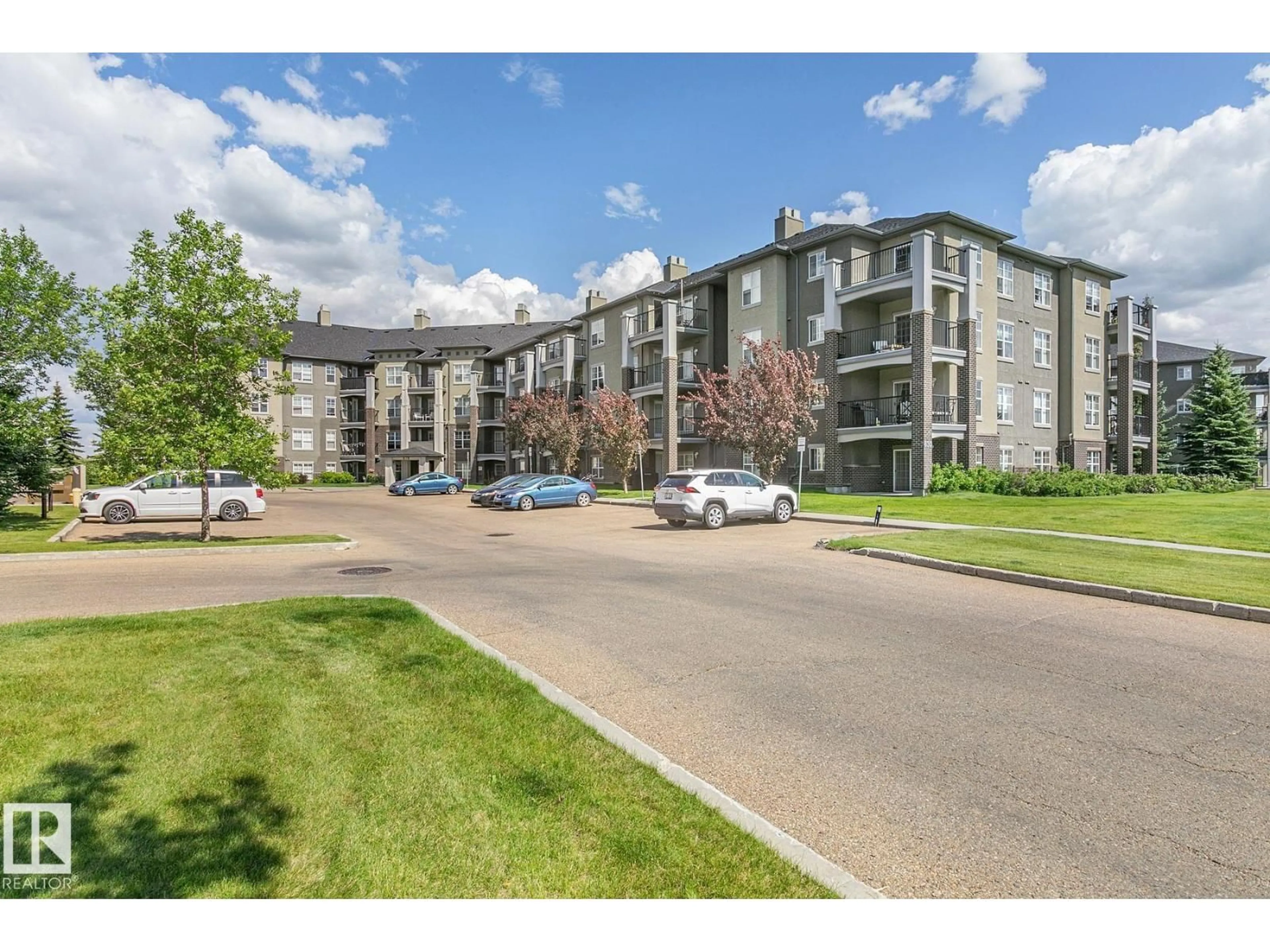 A pic from outside/outdoor area/front of a property/back of a property/a pic from drone, unknown for #112 - 630 MCALLISTER LO, Edmonton Alberta T6W1N3