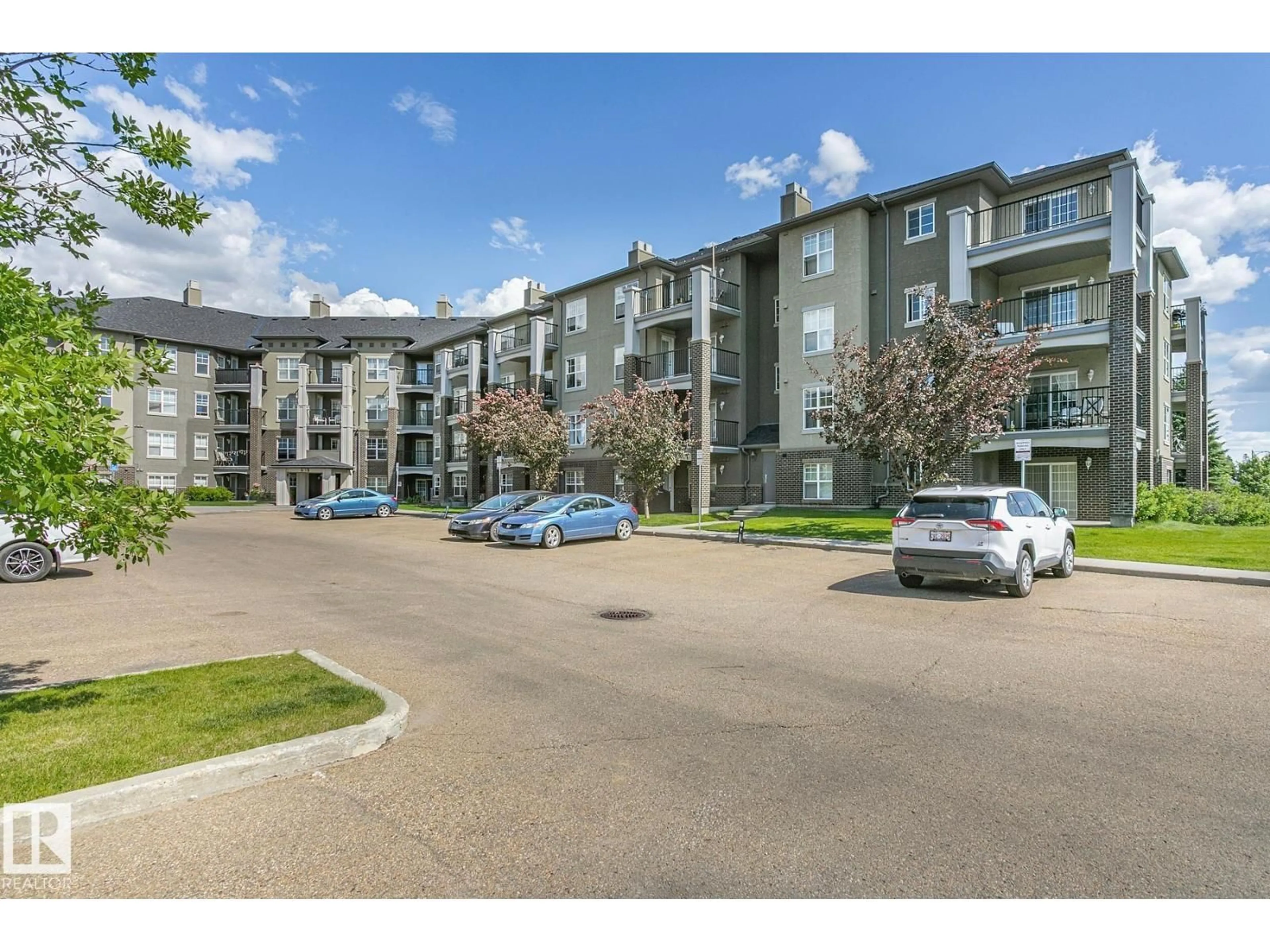 A pic from outside/outdoor area/front of a property/back of a property/a pic from drone, unknown for #112 - 630 MCALLISTER LO, Edmonton Alberta T6W1N3