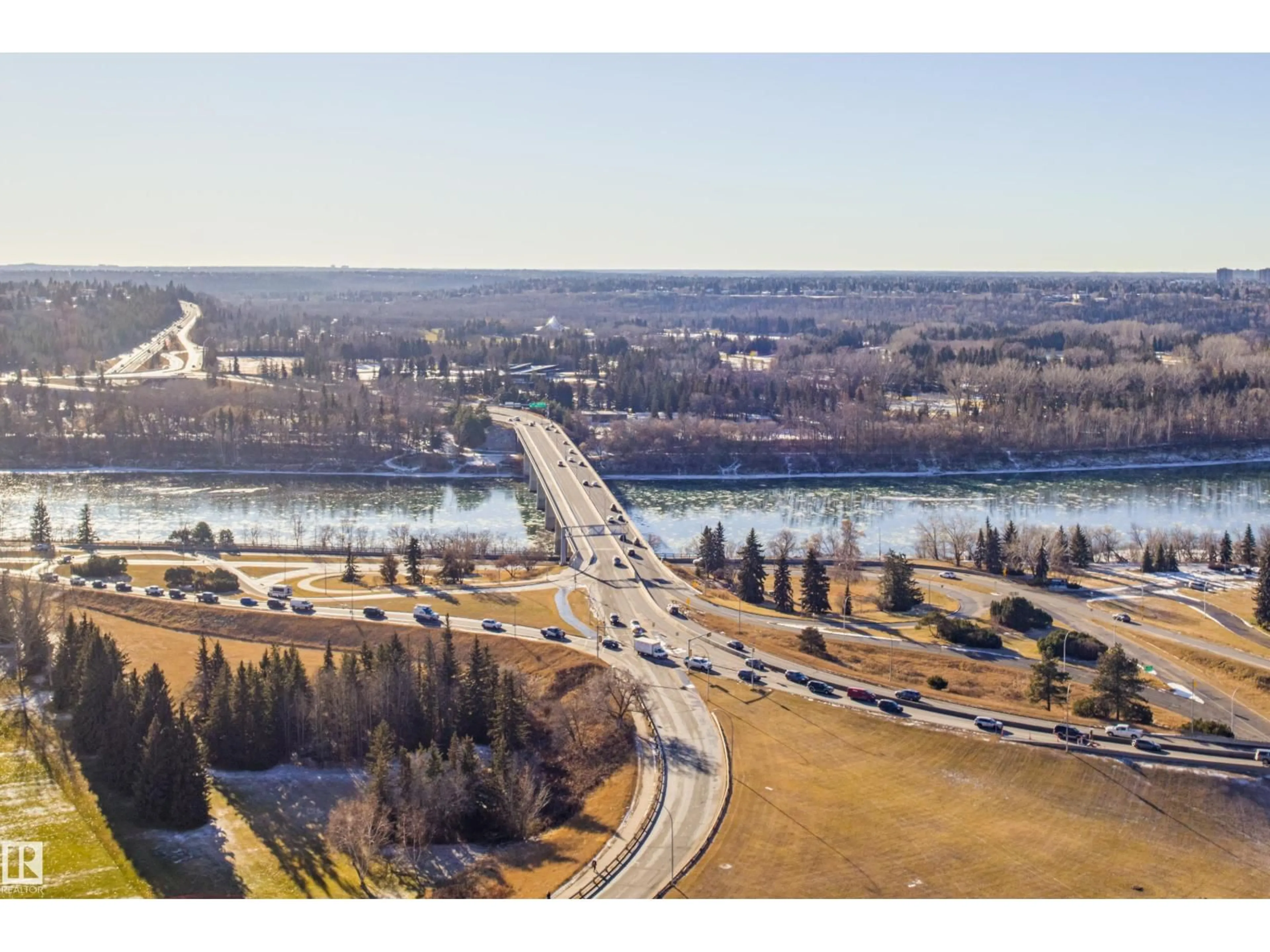 A pic from outside/outdoor area/front of a property/back of a property/a pic from drone, water/lake/river/ocean view for 1703 JASPER AV NW, Edmonton Alberta T5N3K7