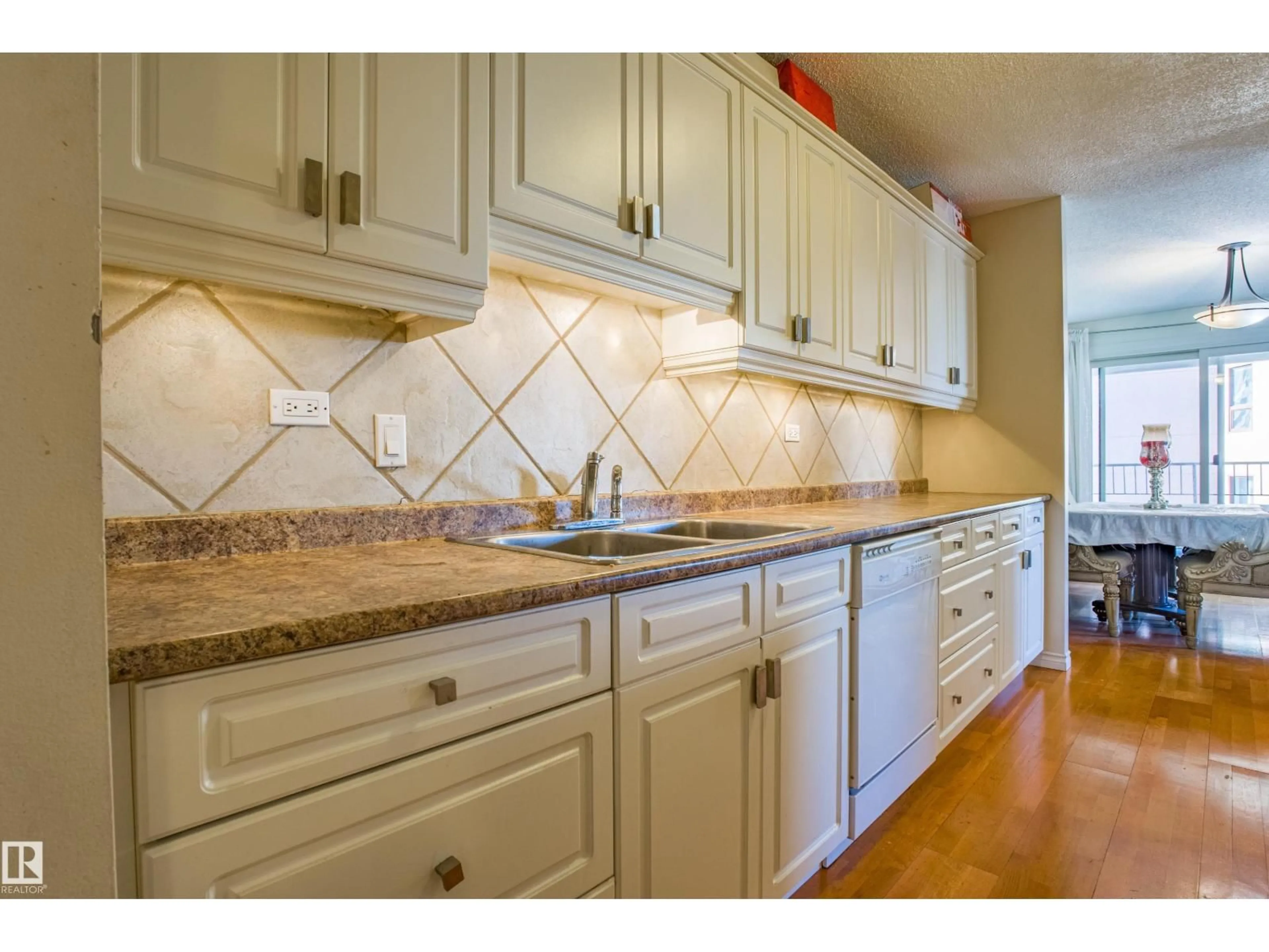 Open concept kitchen, ceramic/tile floor for 1703 JASPER AV NW, Edmonton Alberta T5N3K7