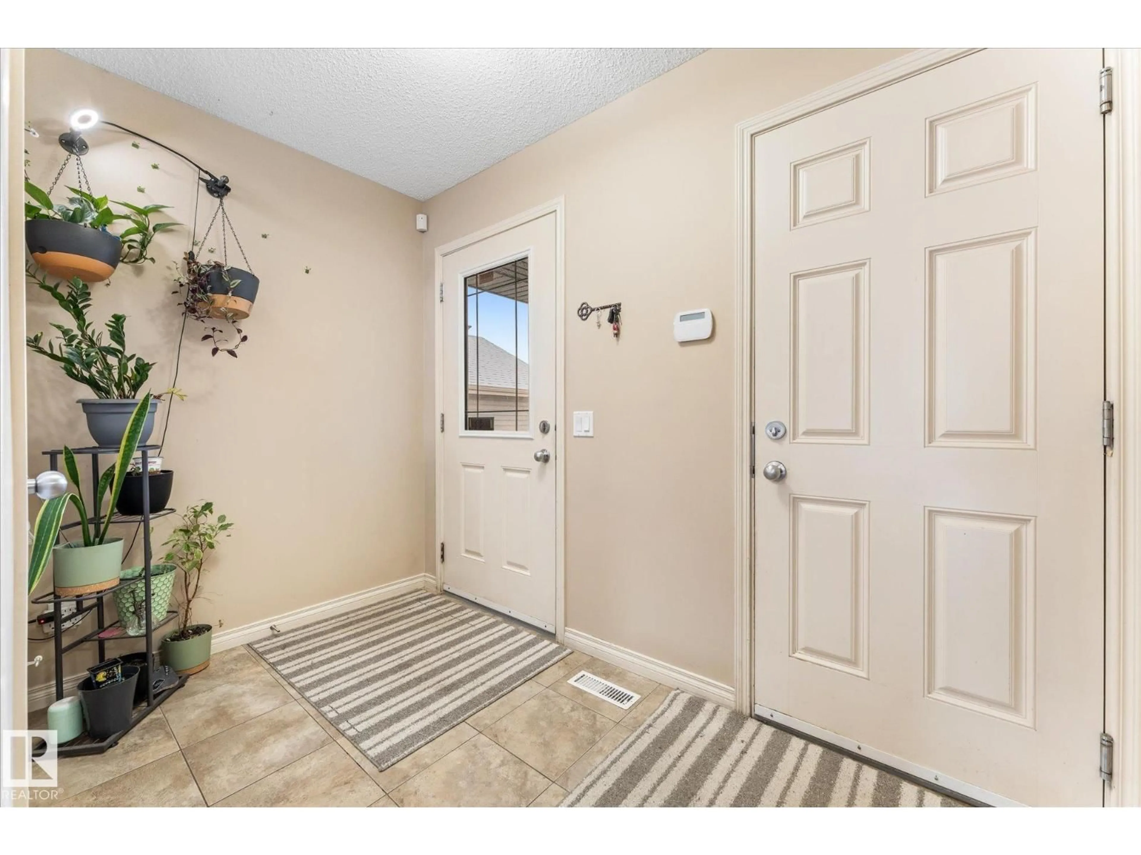Indoor entryway for 51 SILVERSTONE DR, Stony Plain Alberta T7Z0E8