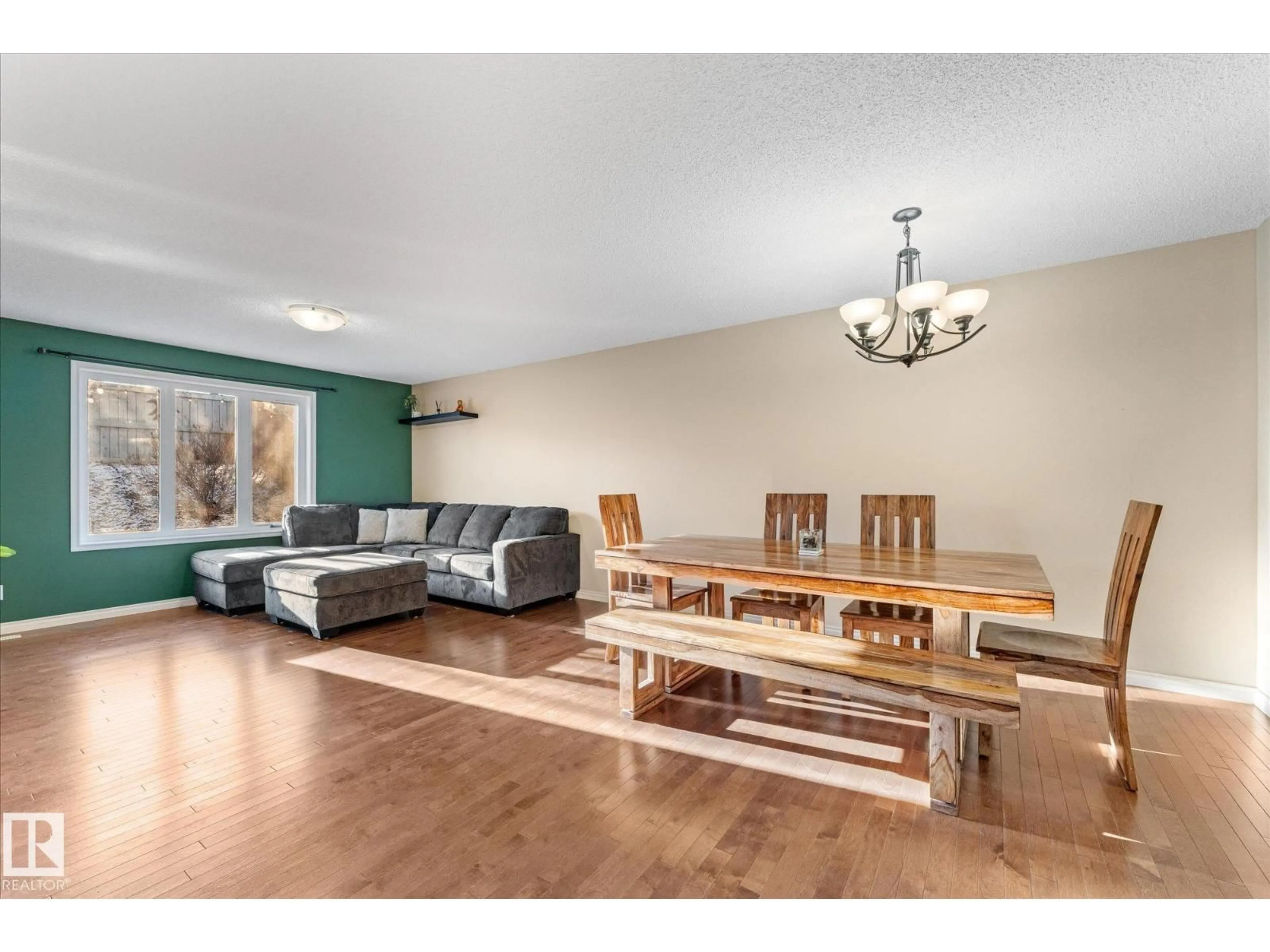 Living room with furniture, wood/laminate floor for 51 SILVERSTONE DR, Stony Plain Alberta T7Z0E8