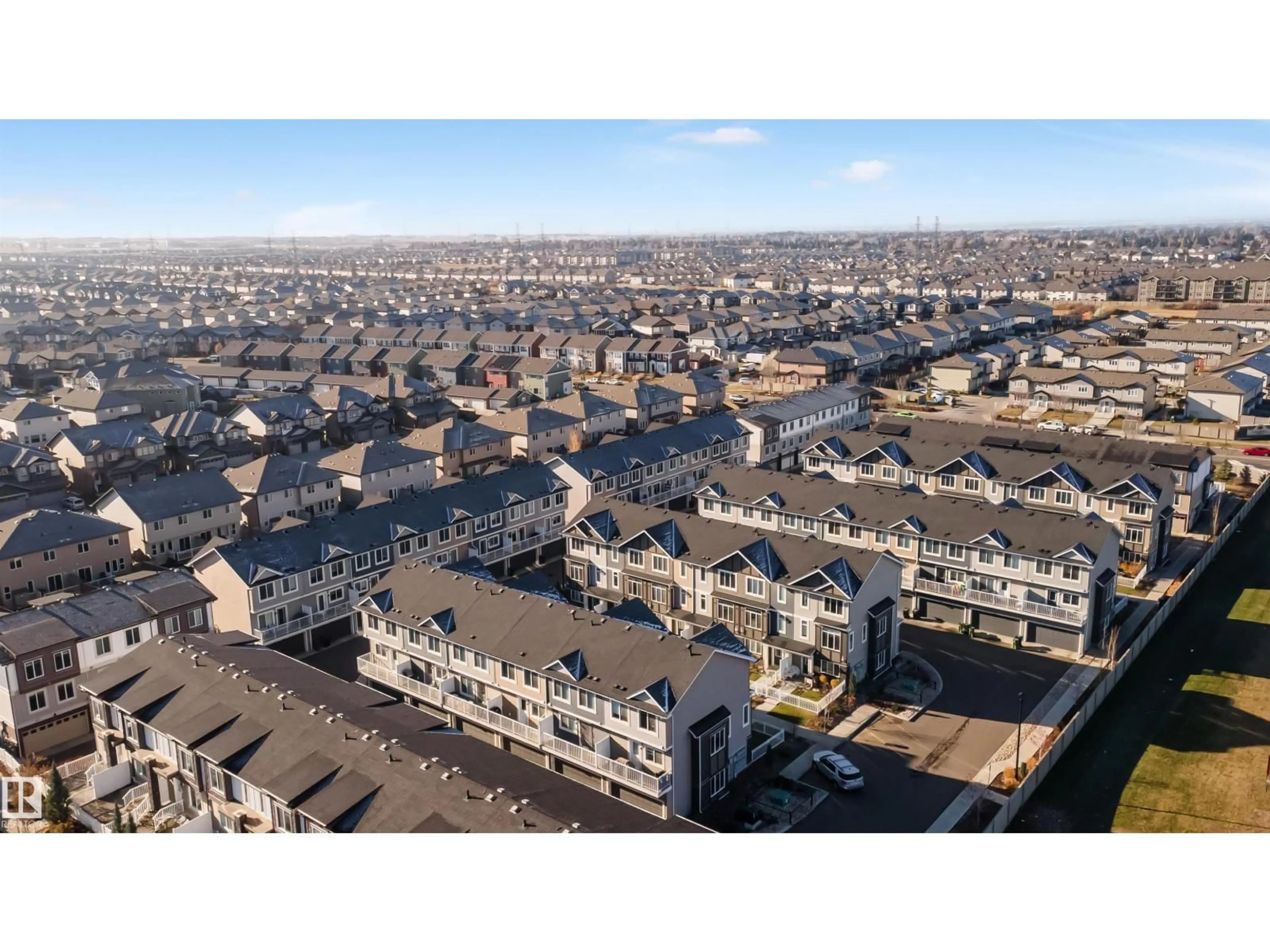 A pic from outside/outdoor area/front of a property/back of a property/a pic from drone, city buildings view from balcony for #57 - 2215 24 ST, Edmonton Alberta T6T1A6