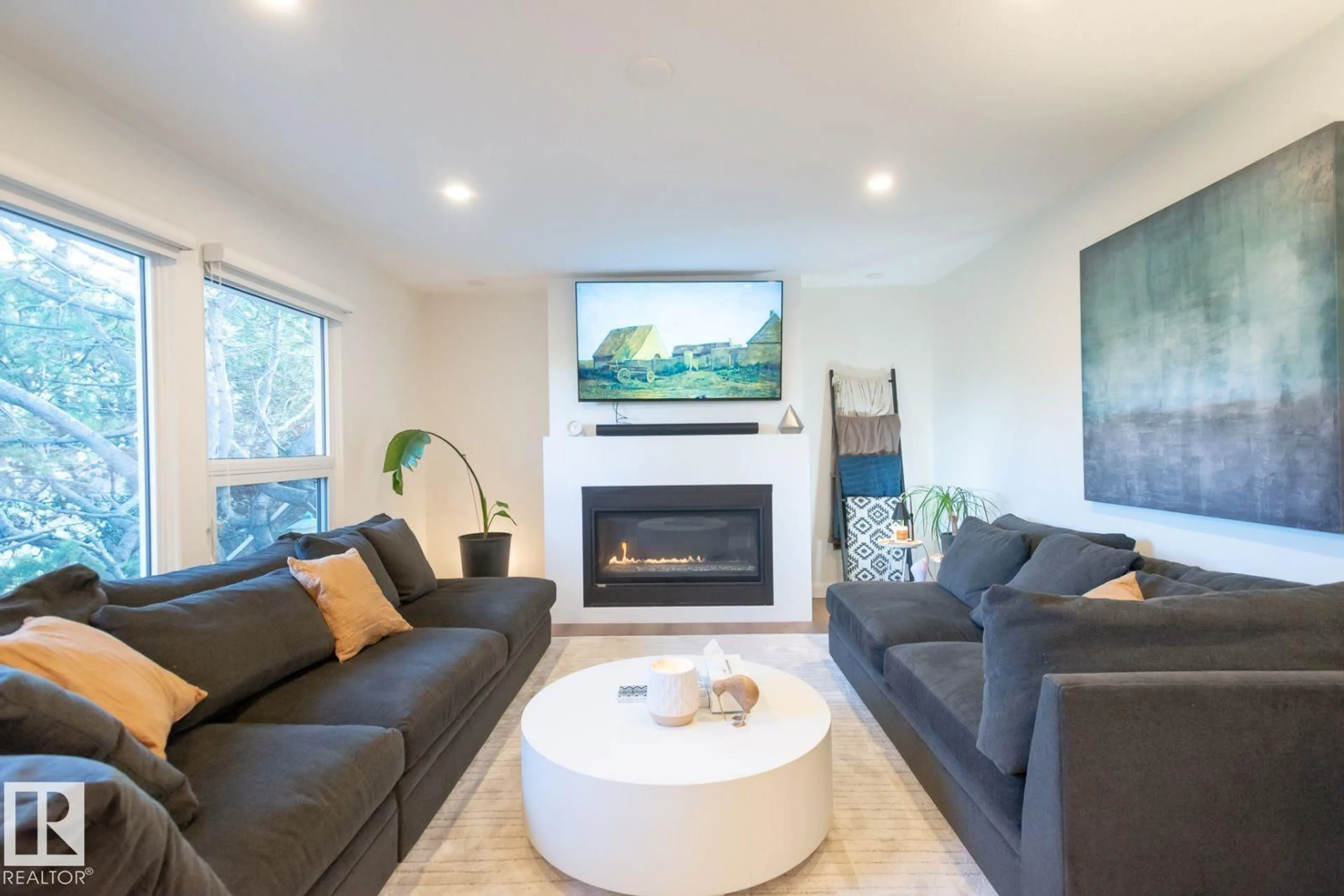 Living room with furniture, wood/laminate floor for NW - 8804 148 ST, Edmonton Alberta T5R0Z9