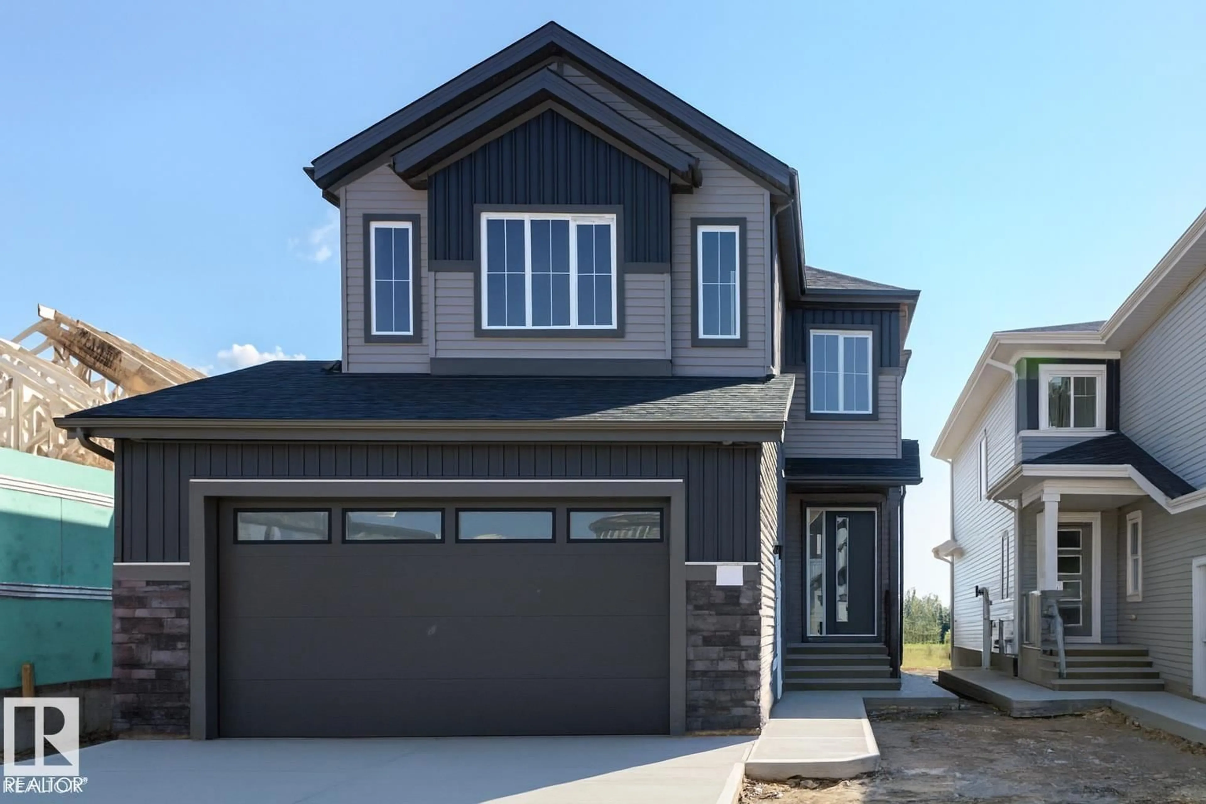 Home with vinyl exterior material, street for 174 CALEDON CR, Spruce Grove Alberta T7X0Y6