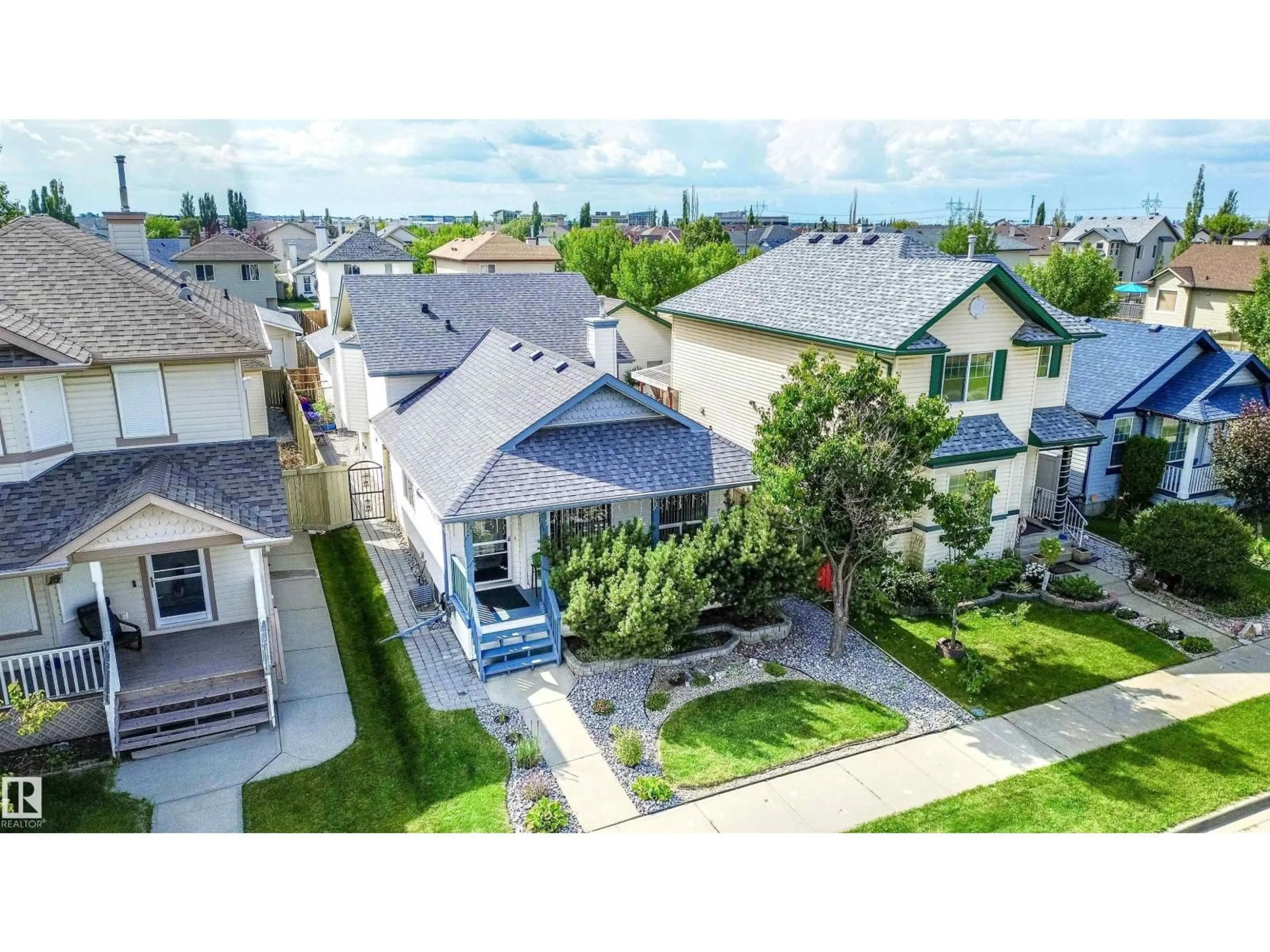 A pic from outside/outdoor area/front of a property/back of a property/a pic from drone, street for 620 88 ST, Edmonton Alberta T6X1E1