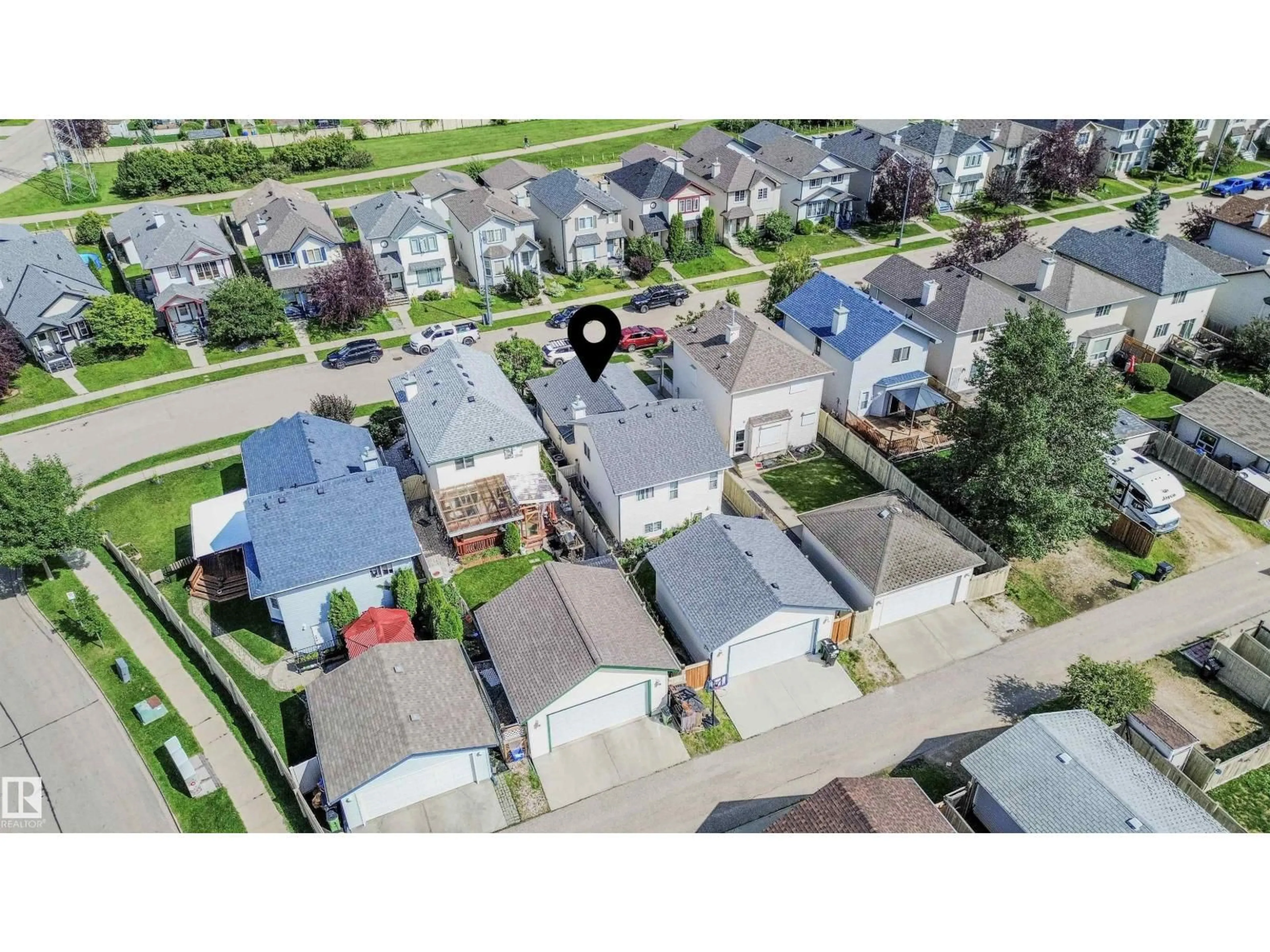 A pic from outside/outdoor area/front of a property/back of a property/a pic from drone, street for 620 88 ST, Edmonton Alberta T6X1E1