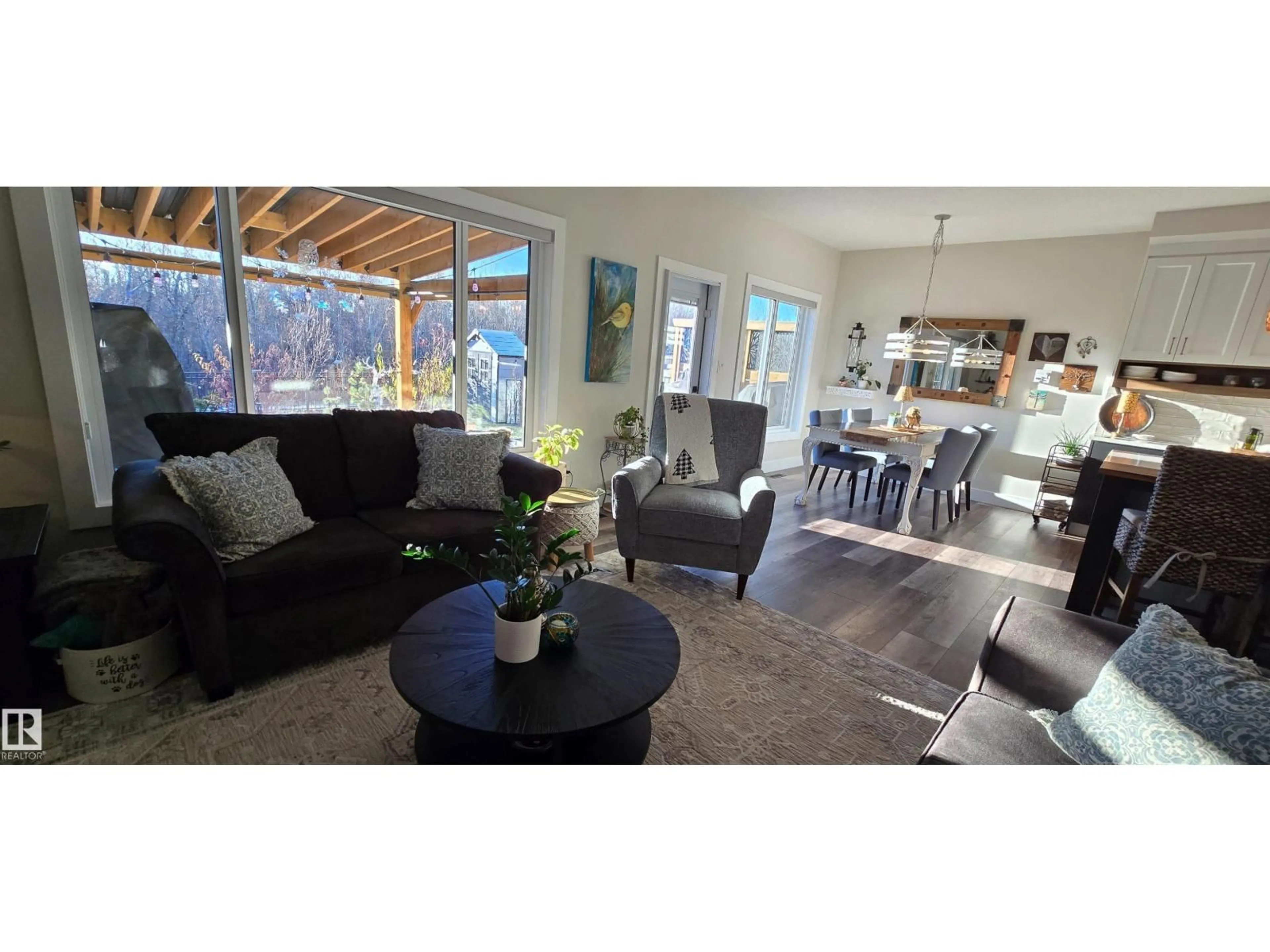 Living room with furniture, wood/laminate floor for 20431 128 AV, Edmonton Alberta T5S0N4