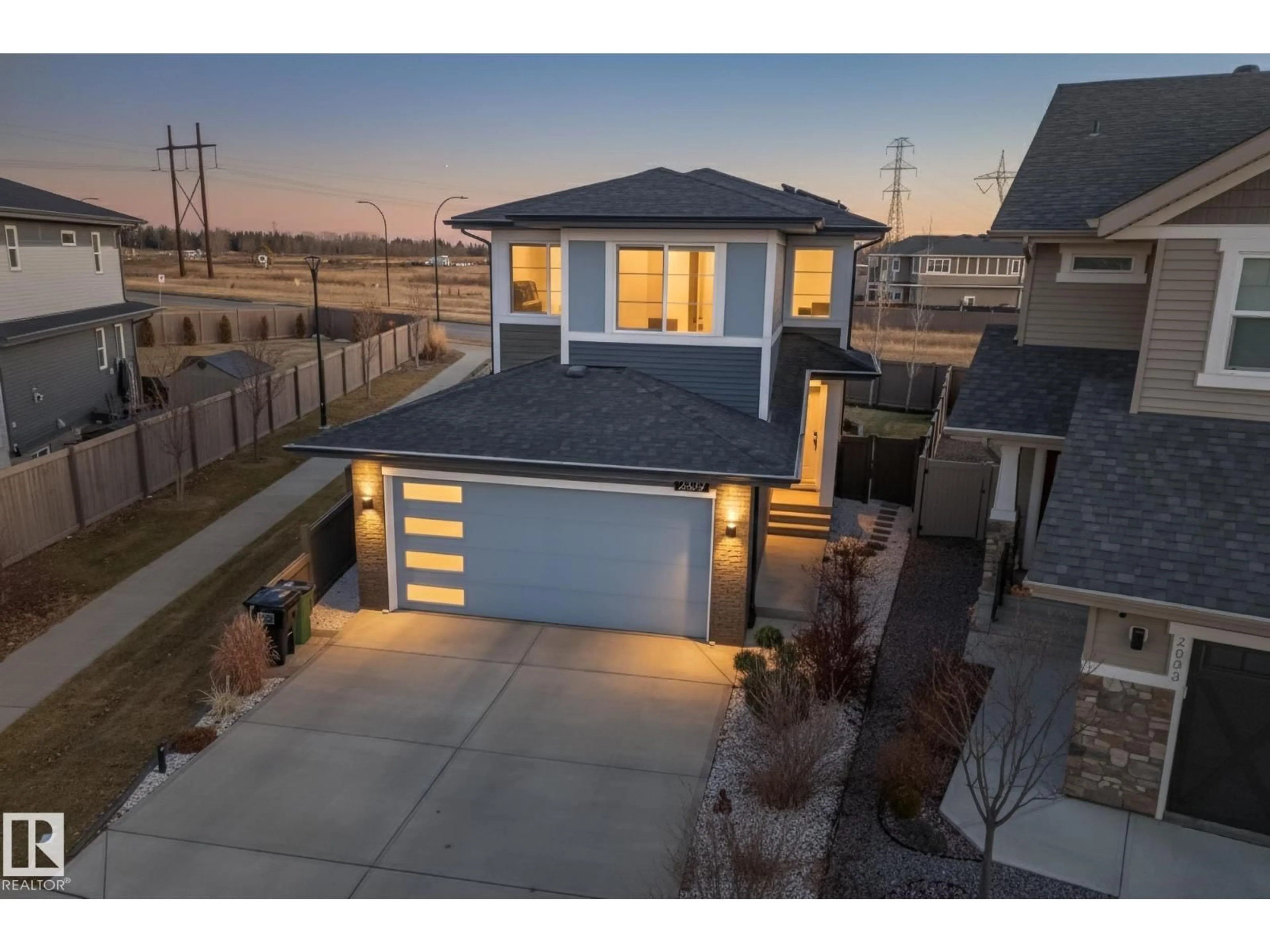 A pic from outside/outdoor area/front of a property/back of a property/a pic from drone, street for NW - 2839 200 ST, Edmonton Alberta T6M0W8