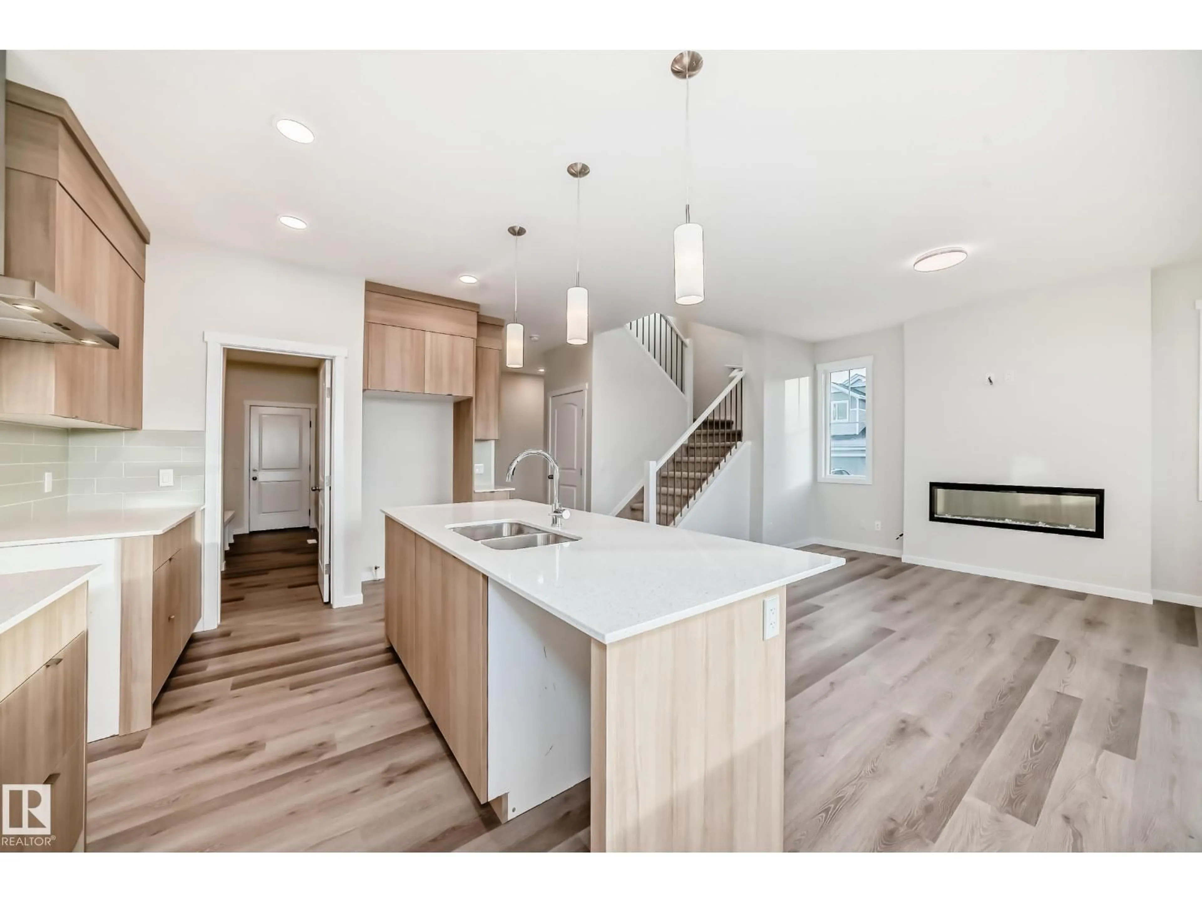 Open concept kitchen, wood/laminate floor for 2346 EGRET WY, Edmonton Alberta T6M3G8