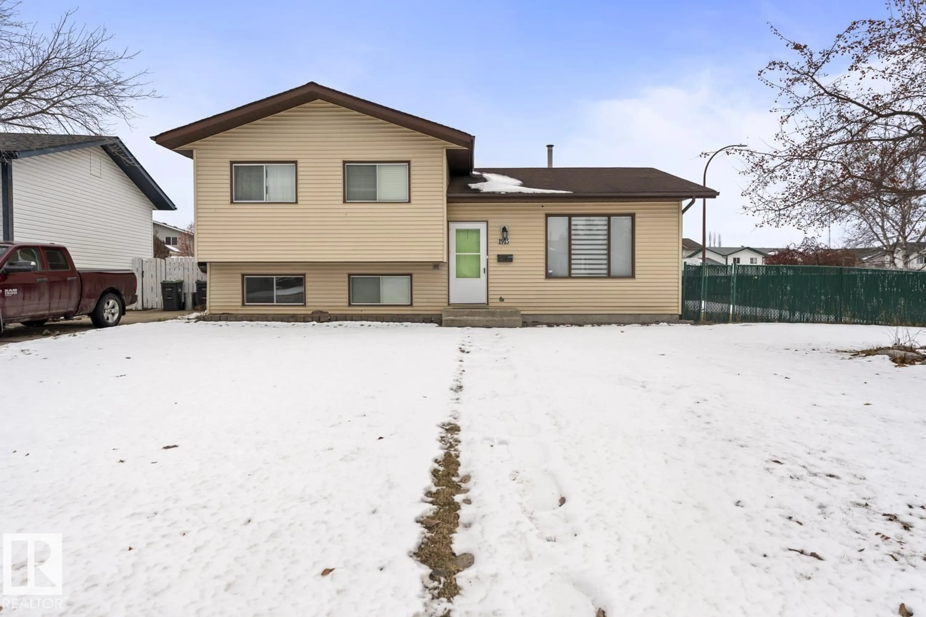 Home with vinyl exterior material, street for 1915 5 AV, Cold Lake Alberta T9M1B7