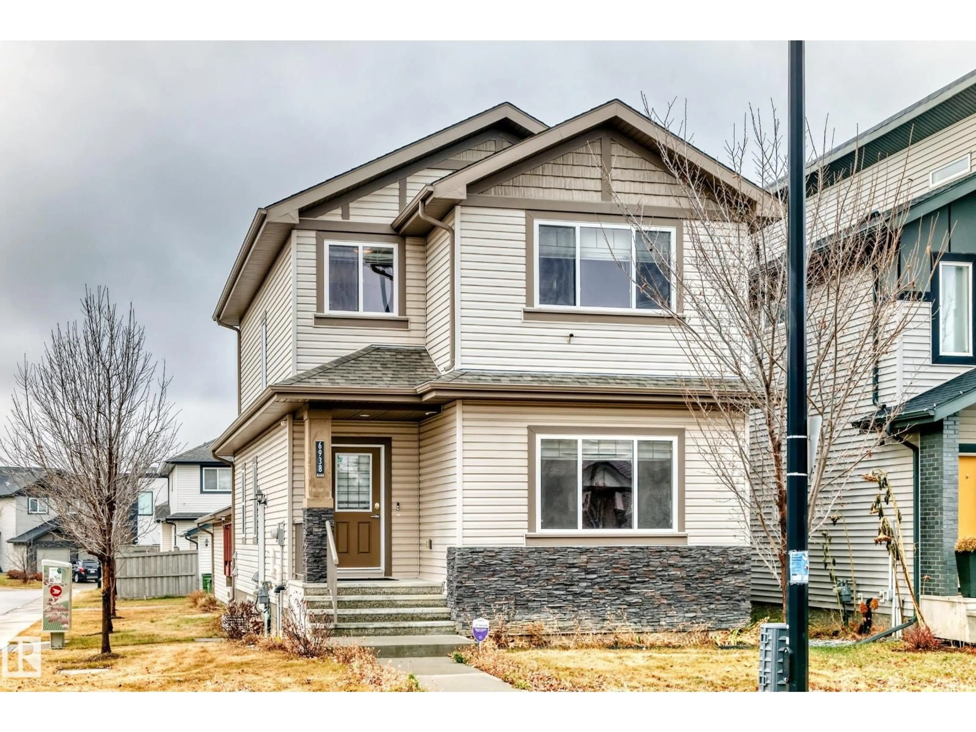 Home with vinyl exterior material, street for SW - 6938 CARDINAL WD, Edmonton Alberta T6W2Y3