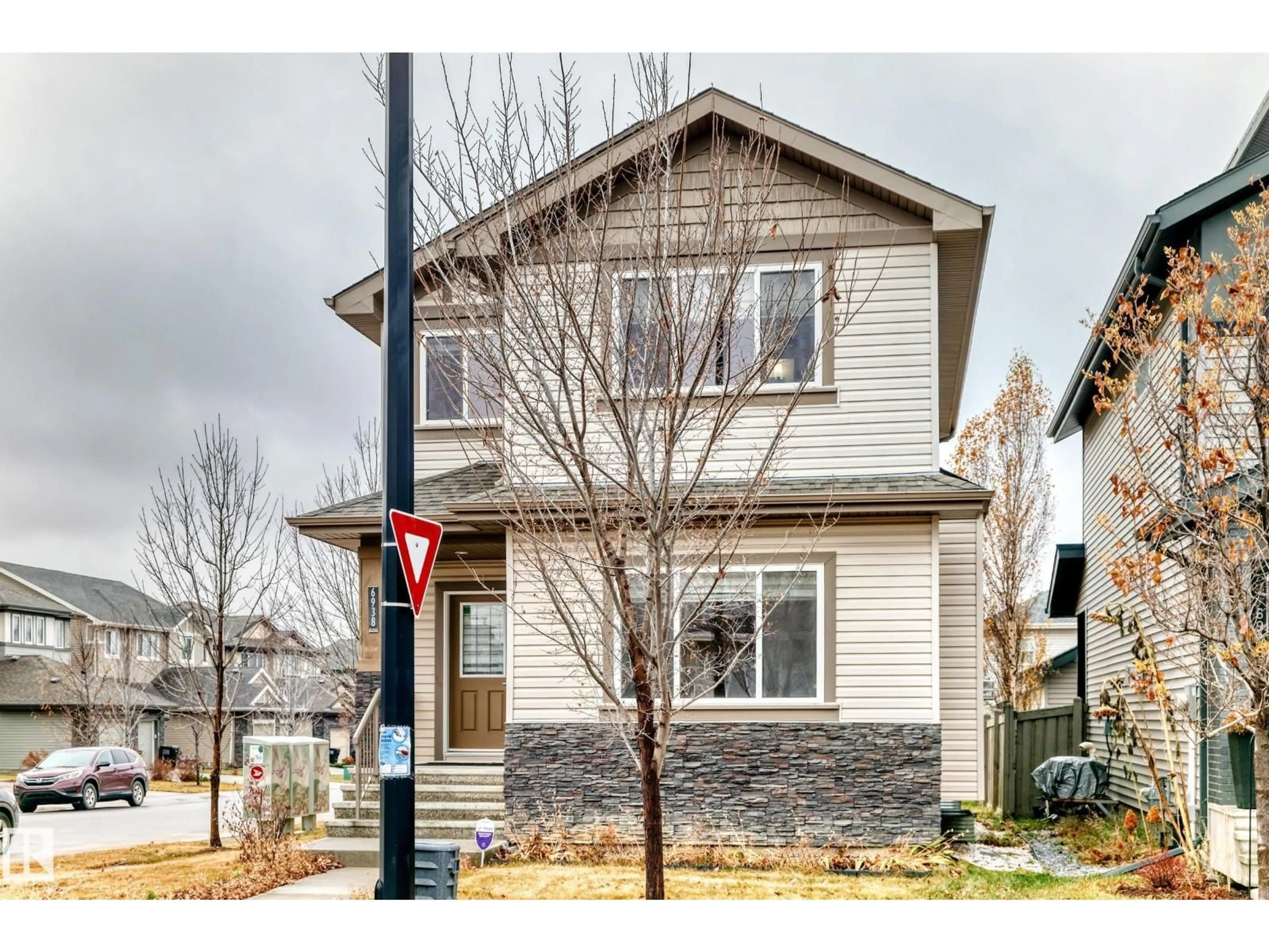 Home with vinyl exterior material, street for SW - 6938 CARDINAL WD, Edmonton Alberta T6W2Y3