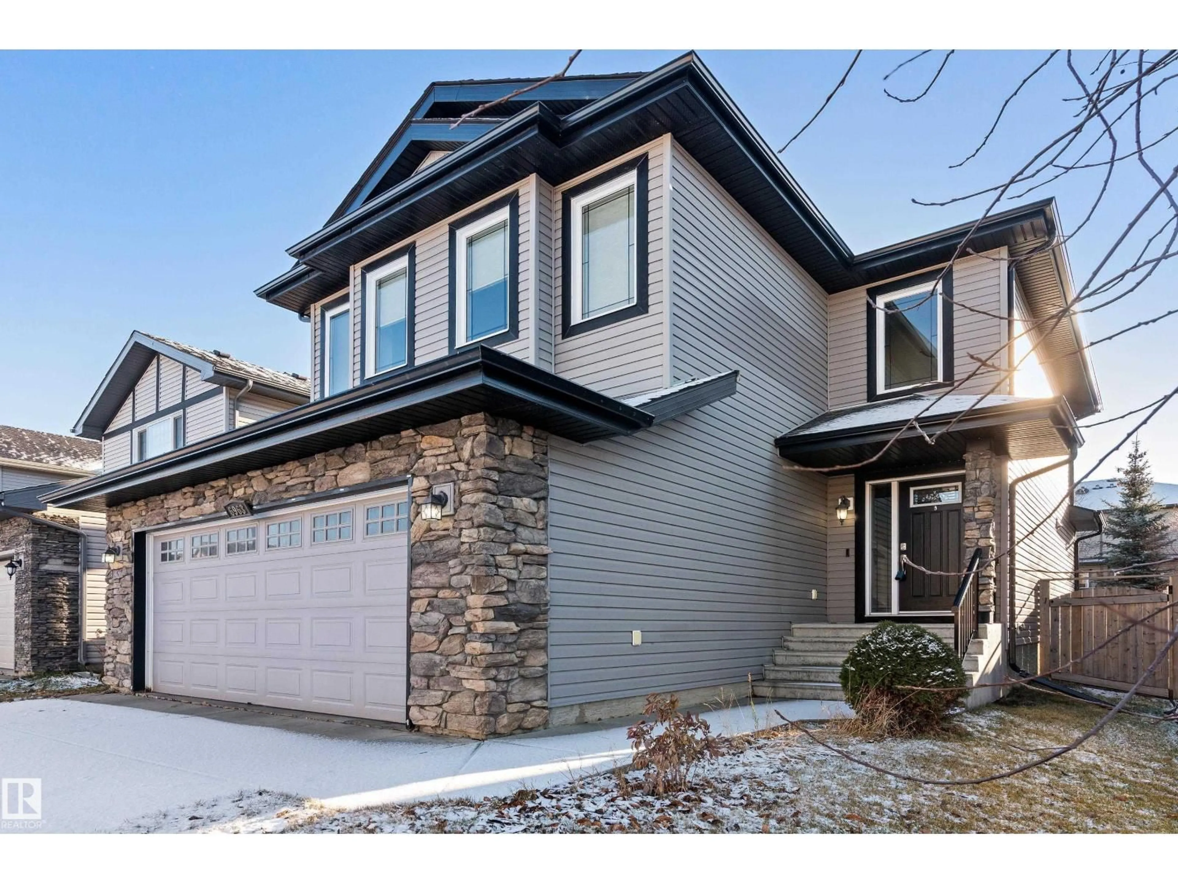 Home with brick exterior material, street for SW - 6963 19A AV, Edmonton Alberta T6X0L7