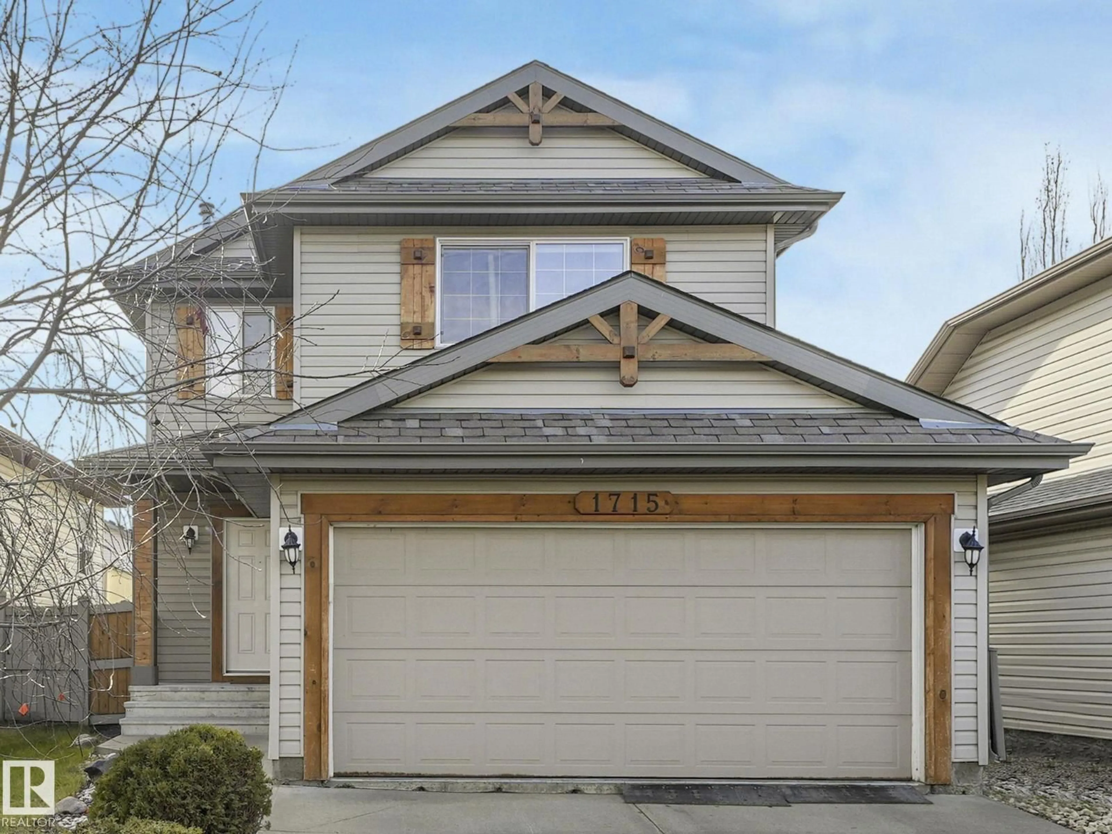 Home with vinyl exterior material, street for 1715 MELROSE CR, Edmonton Alberta T6W0B2