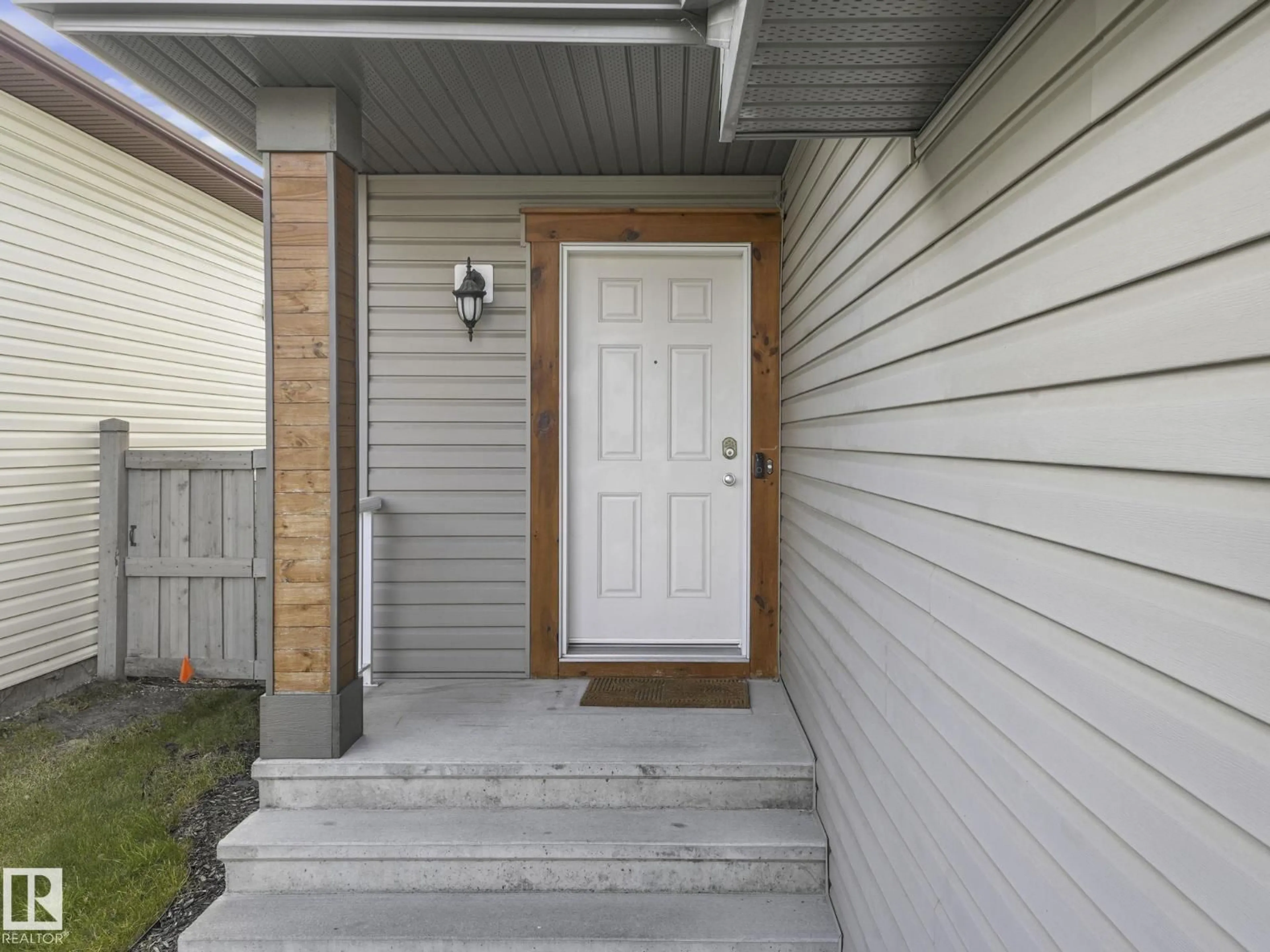 Home with vinyl exterior material, street for 1715 MELROSE CR, Edmonton Alberta T6W0B2