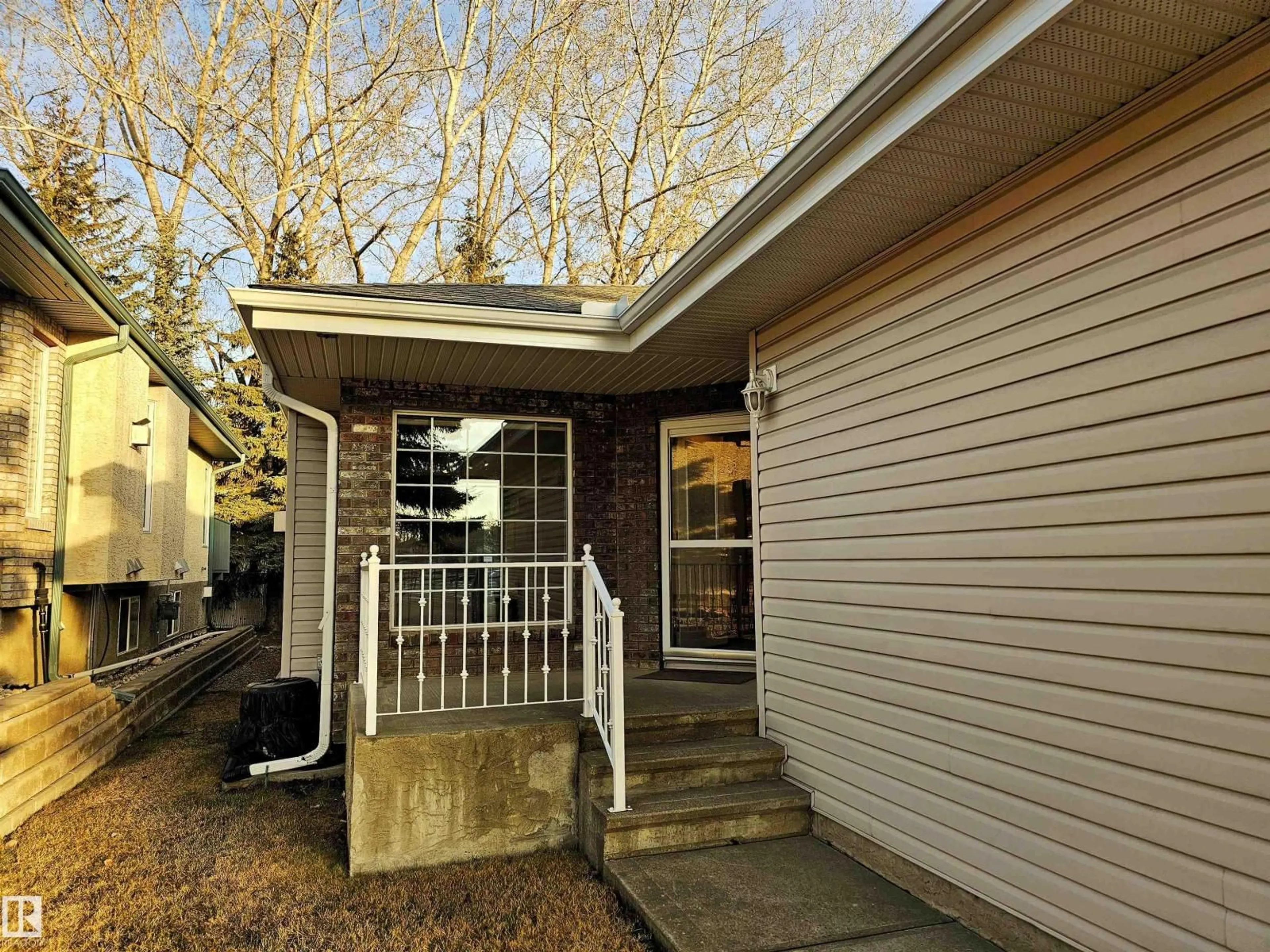 Home with vinyl exterior material, street for 27 EDWARD WY, St. Albert Alberta T8N6Y1