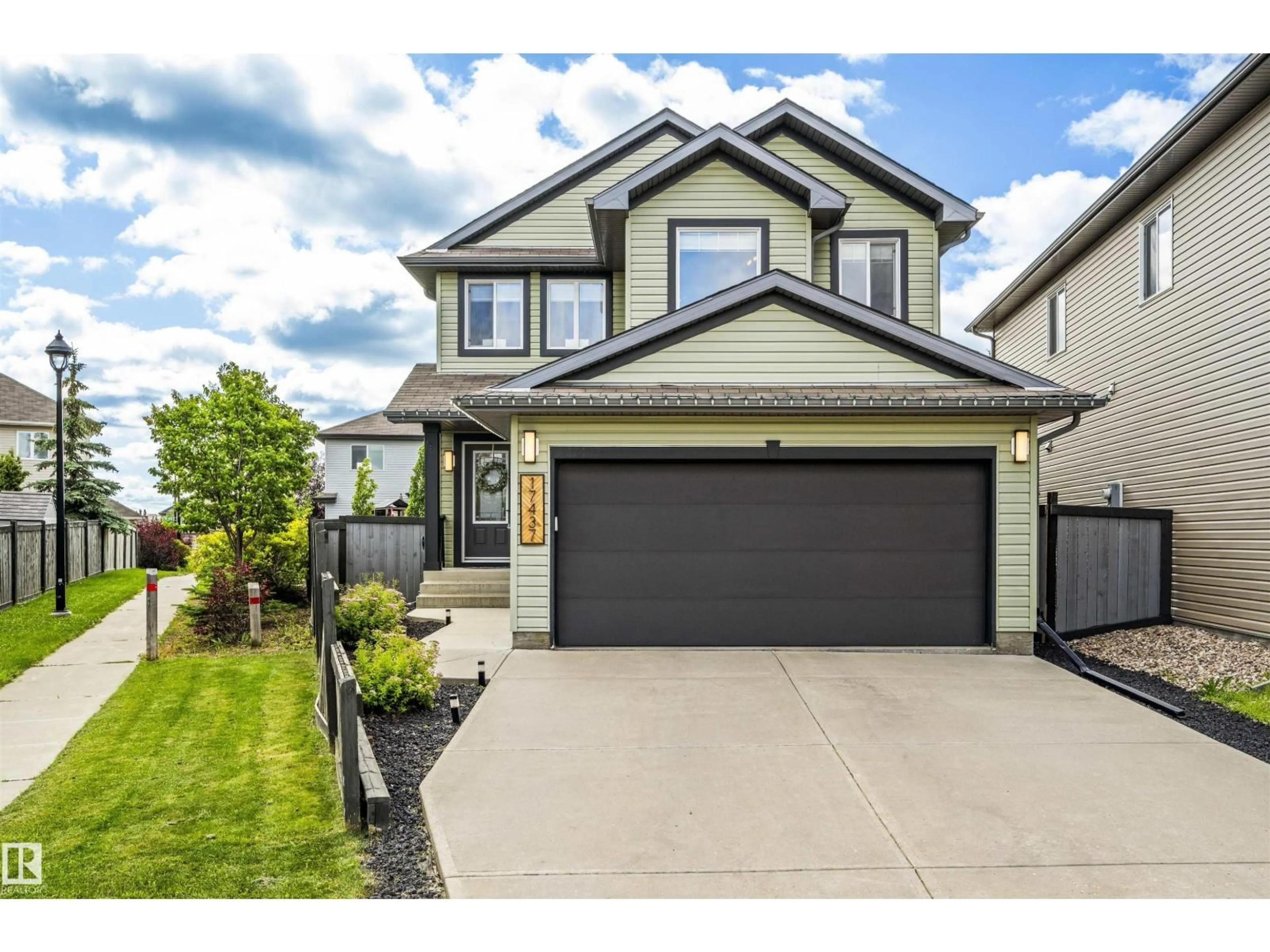 Home with vinyl exterior material, street for 17437 5A AV SW, Edmonton Alberta T6W2E3