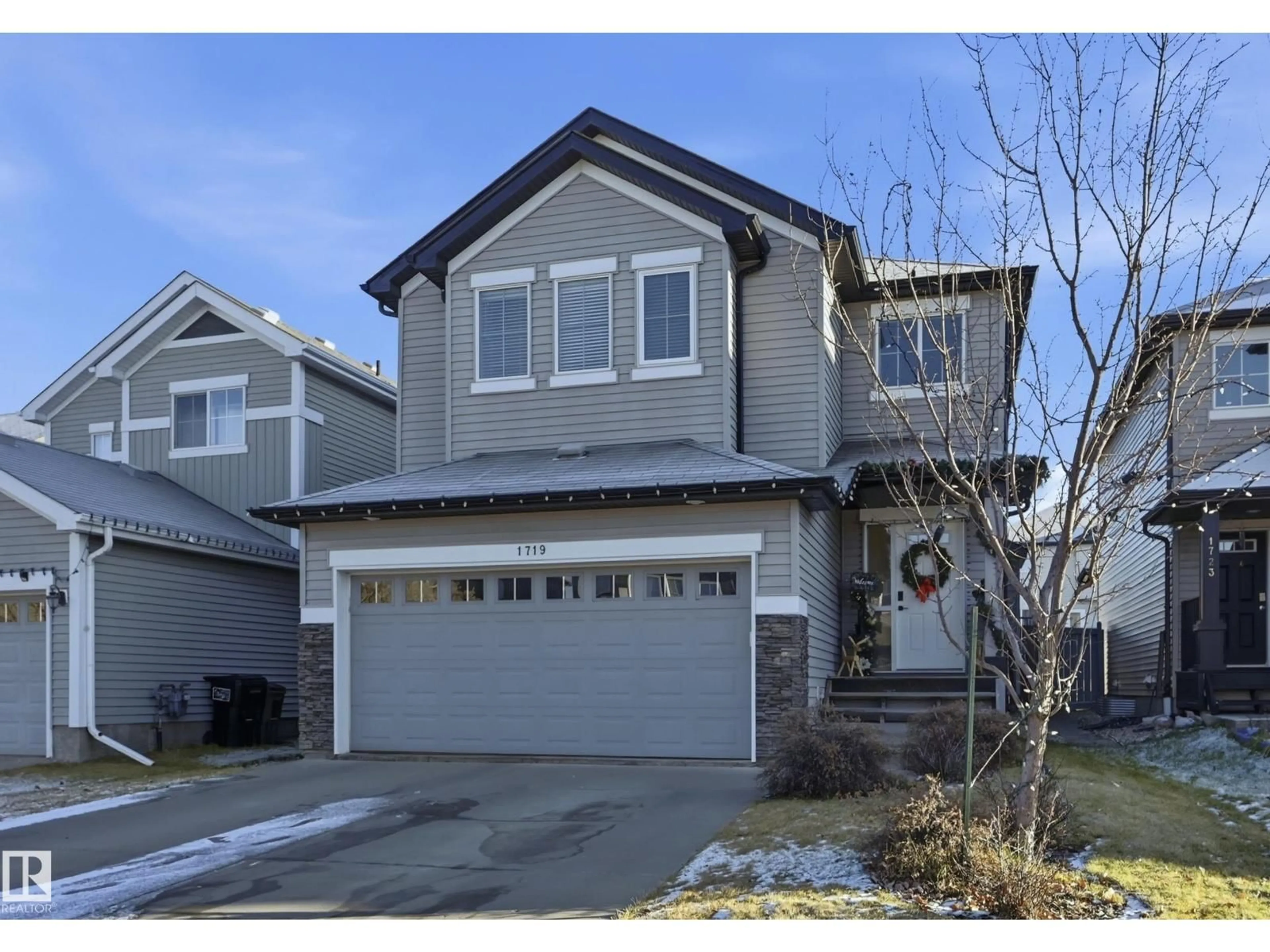 Home with vinyl exterior material, street for SW - 1719 61 ST, Edmonton Alberta T6X0W3