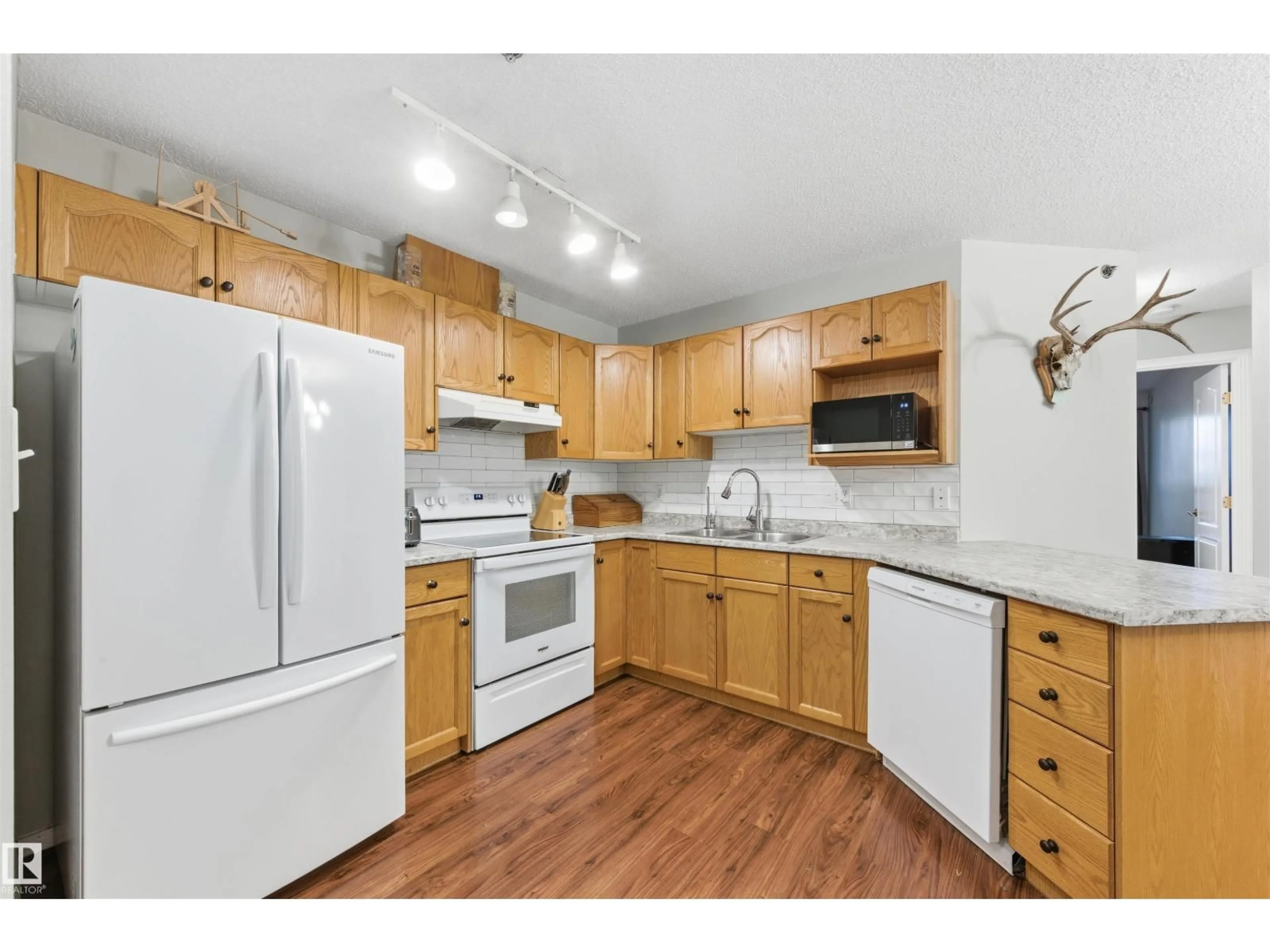 Standard kitchen, wood/laminate floor for 201 - 9640 105 ST, Edmonton Alberta T5K0Z7