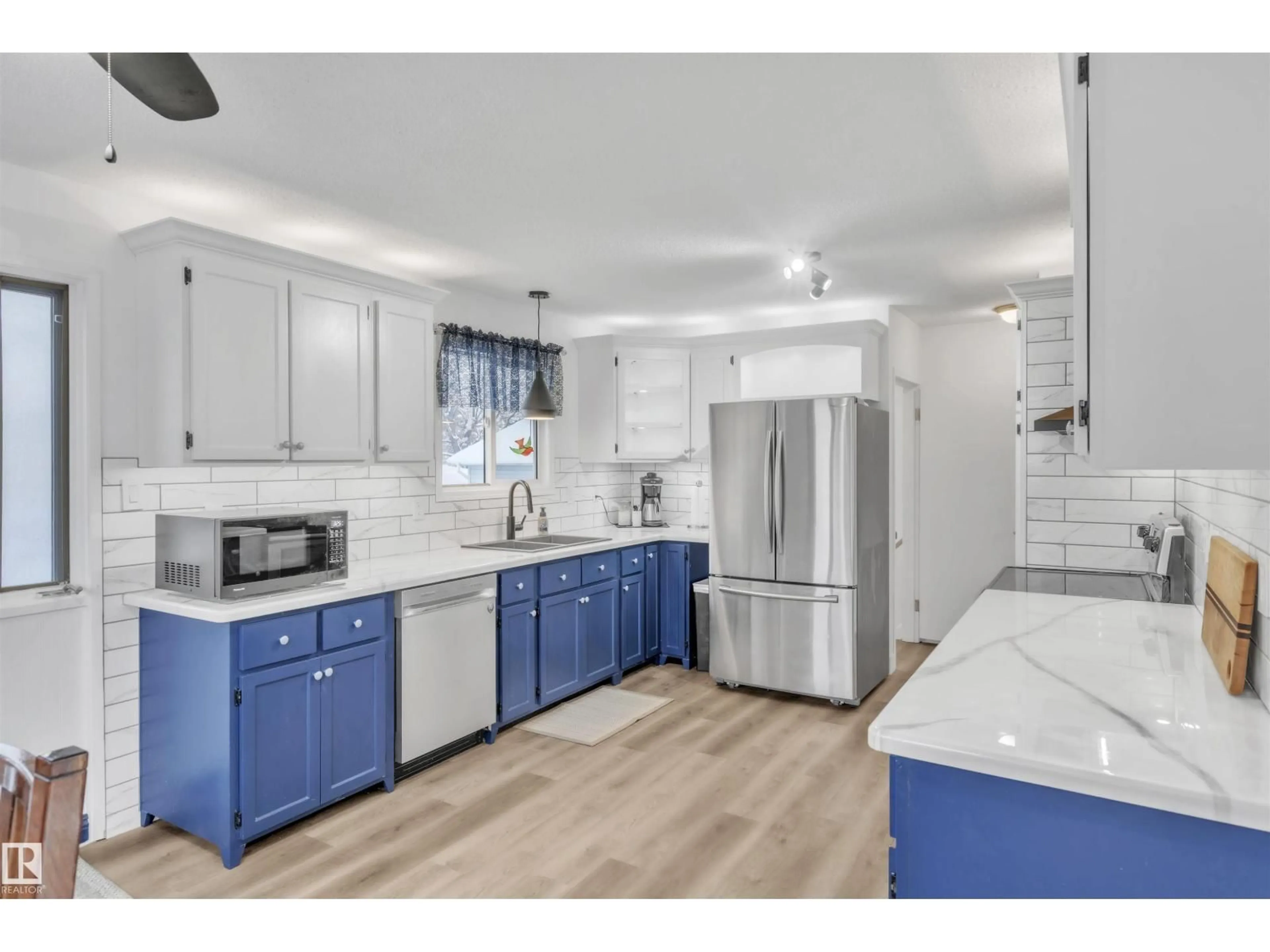 Open concept kitchen, ceramic/tile floor for 4611 46 ST, Bonnyville Town Alberta T9N1M1