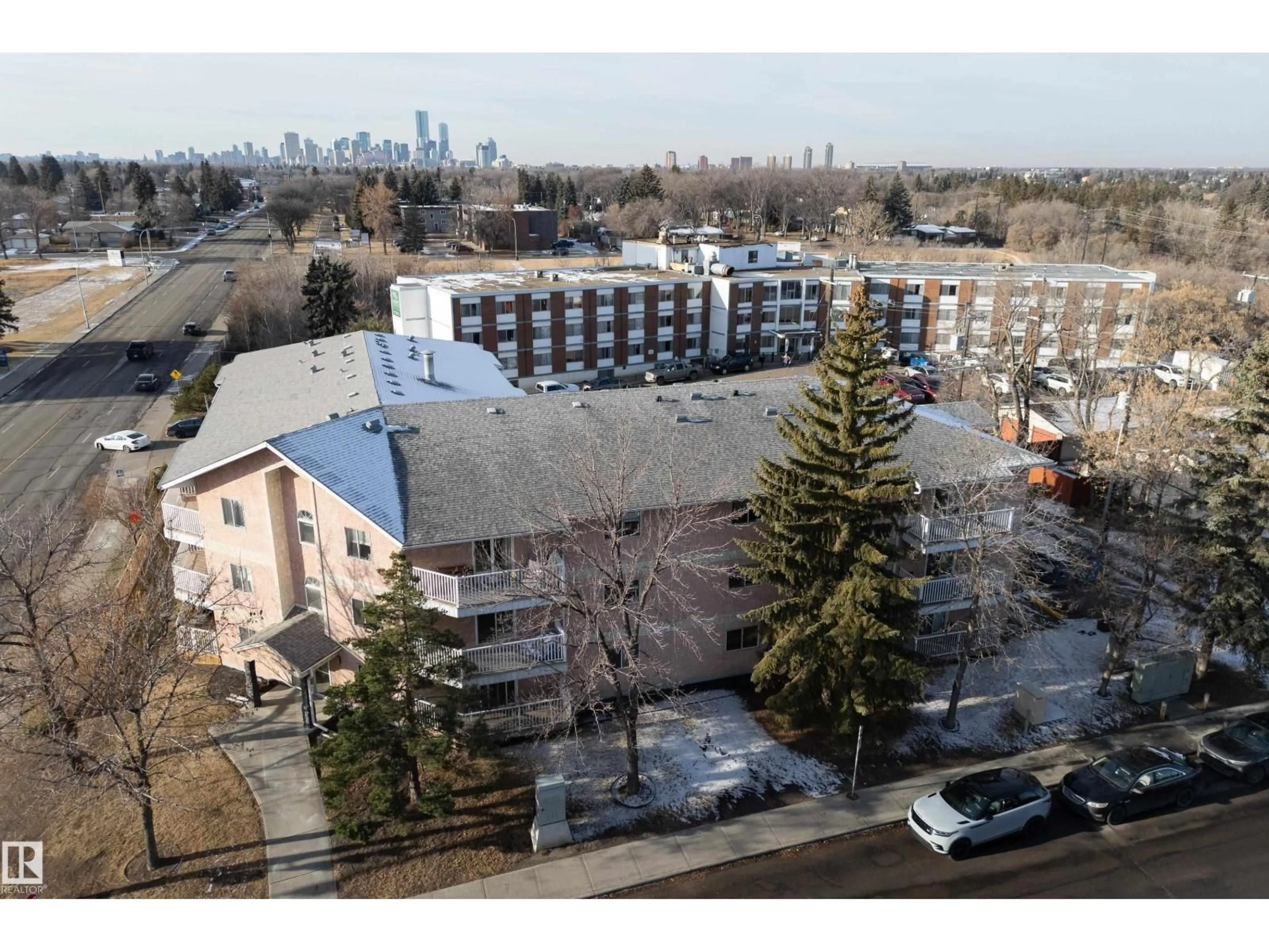 A pic from outside/outdoor area/front of a property/back of a property/a pic from drone, city buildings view from balcony for #105 - 6310 101 AV NW, Edmonton Alberta T6A0H5