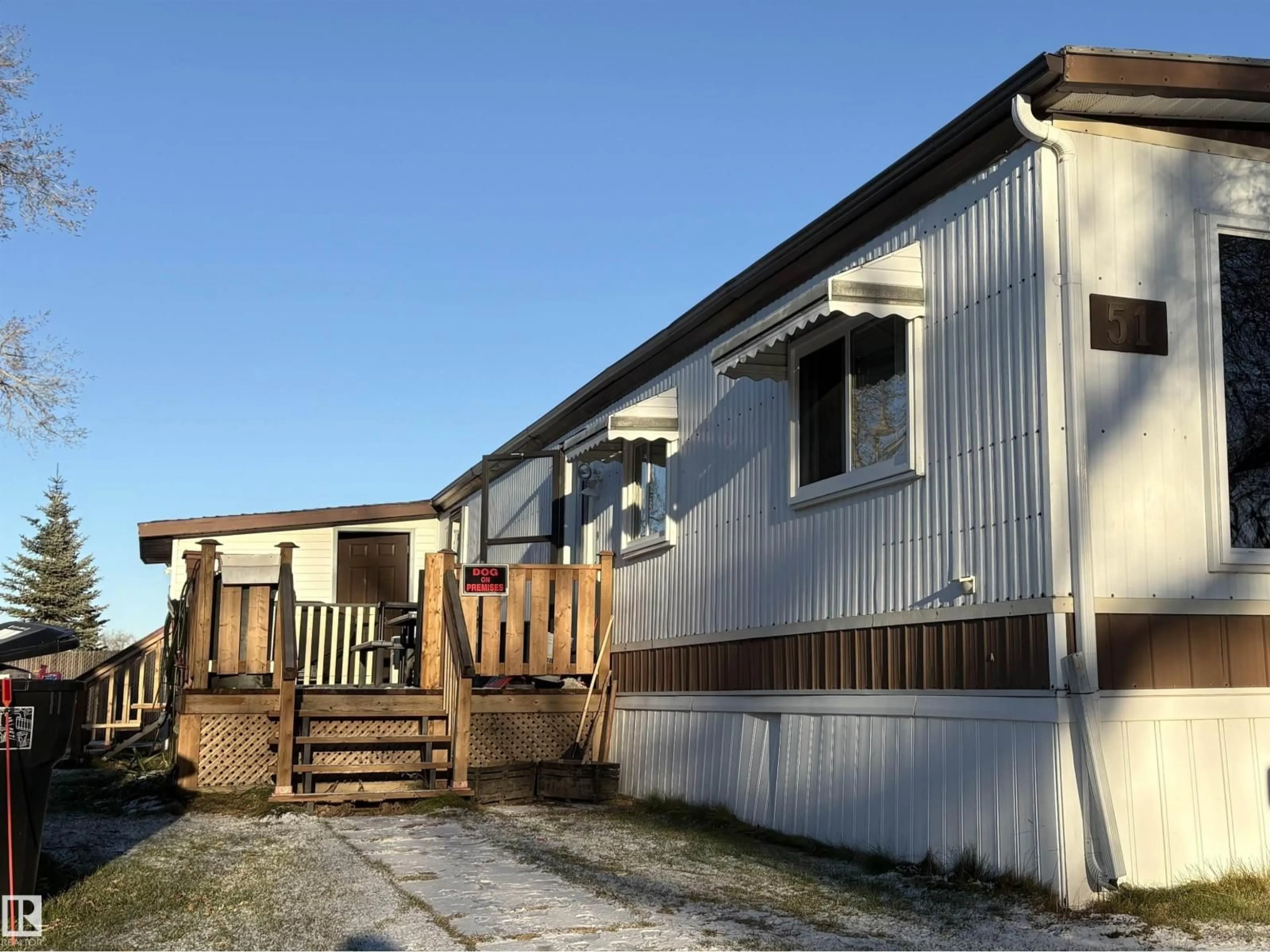 Home with vinyl exterior material, street for 51 12604 153 AV, Edmonton Alberta T5X4M7