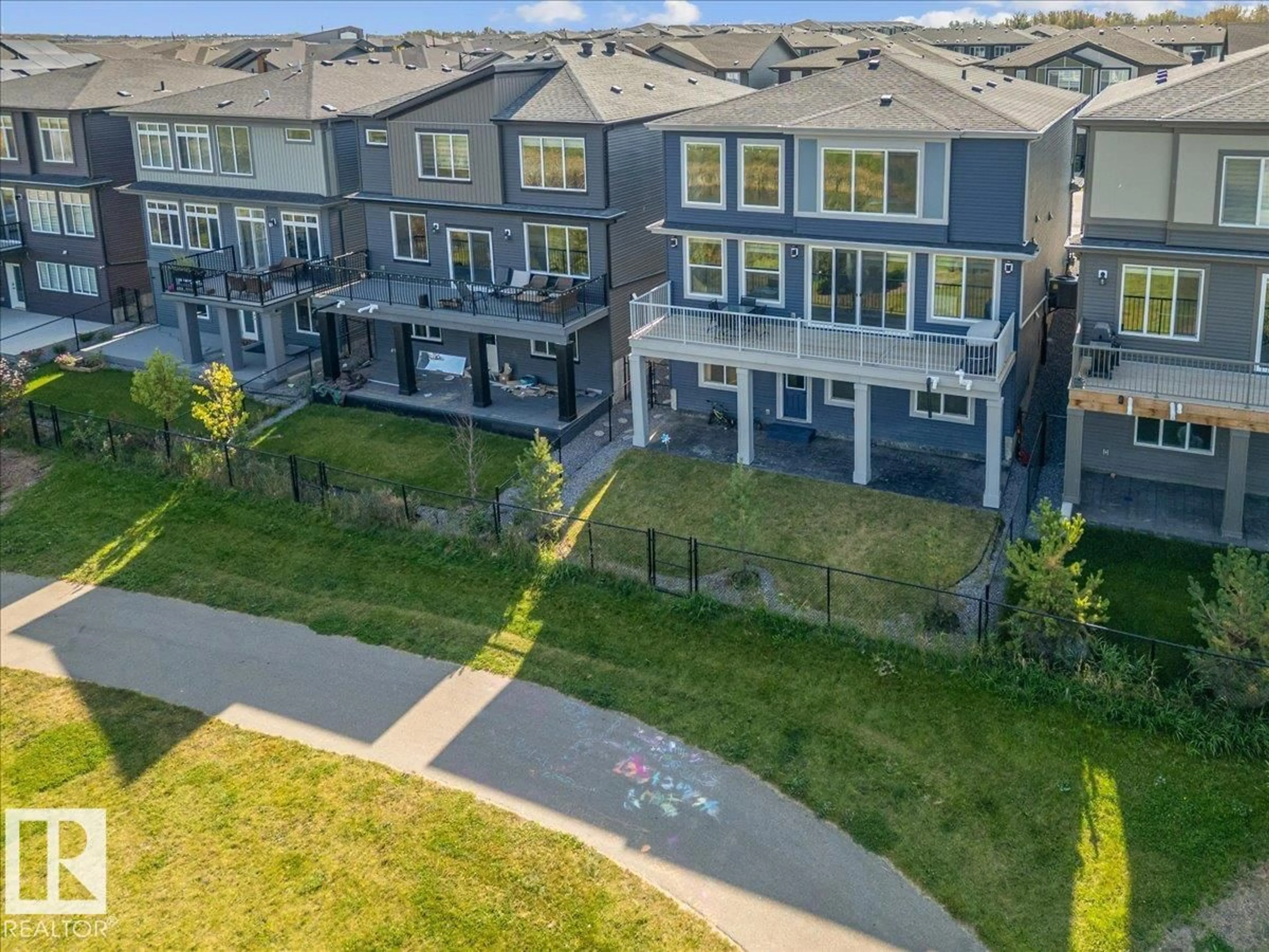 A pic from outside/outdoor area/front of a property/back of a property/a pic from drone, mountain view for SW - 6456 KING WD, Edmonton Alberta T6W4R6