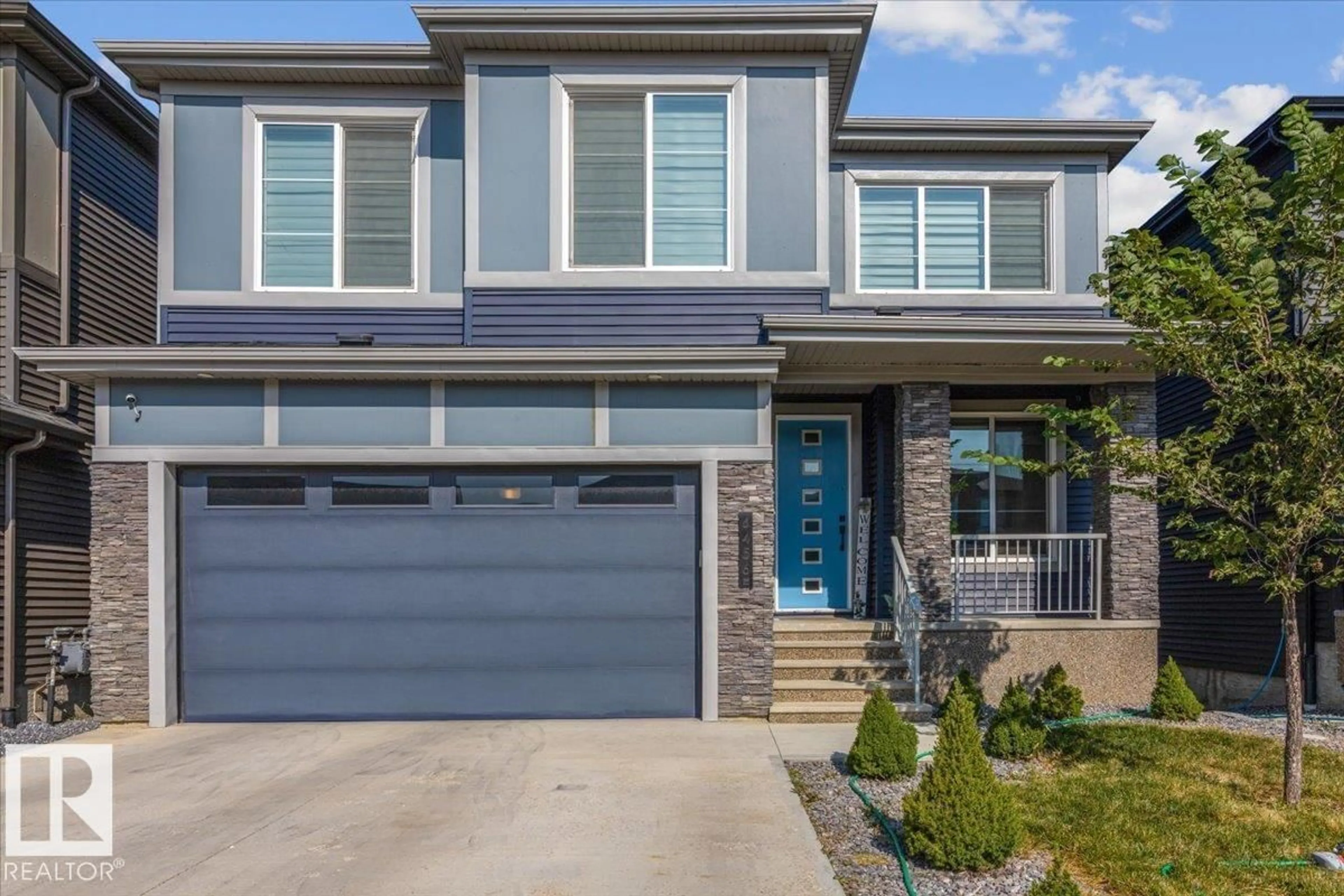 Home with vinyl exterior material, street for SW - 6456 KING WD, Edmonton Alberta T6W4R6