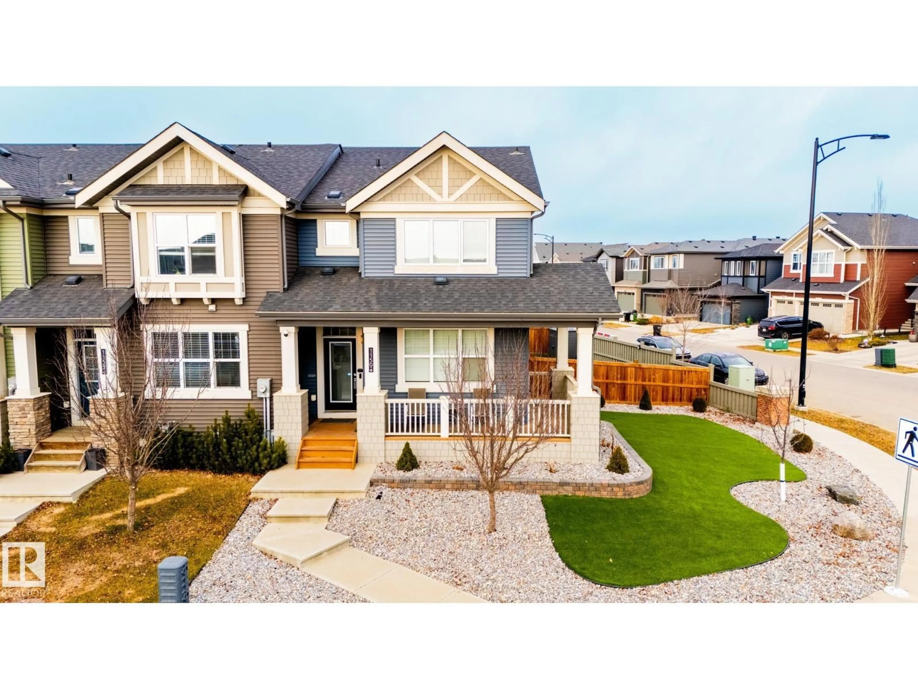 Home with vinyl exterior material, street for 1150 ROSENTHAL BV, Edmonton Alberta T5T7L3