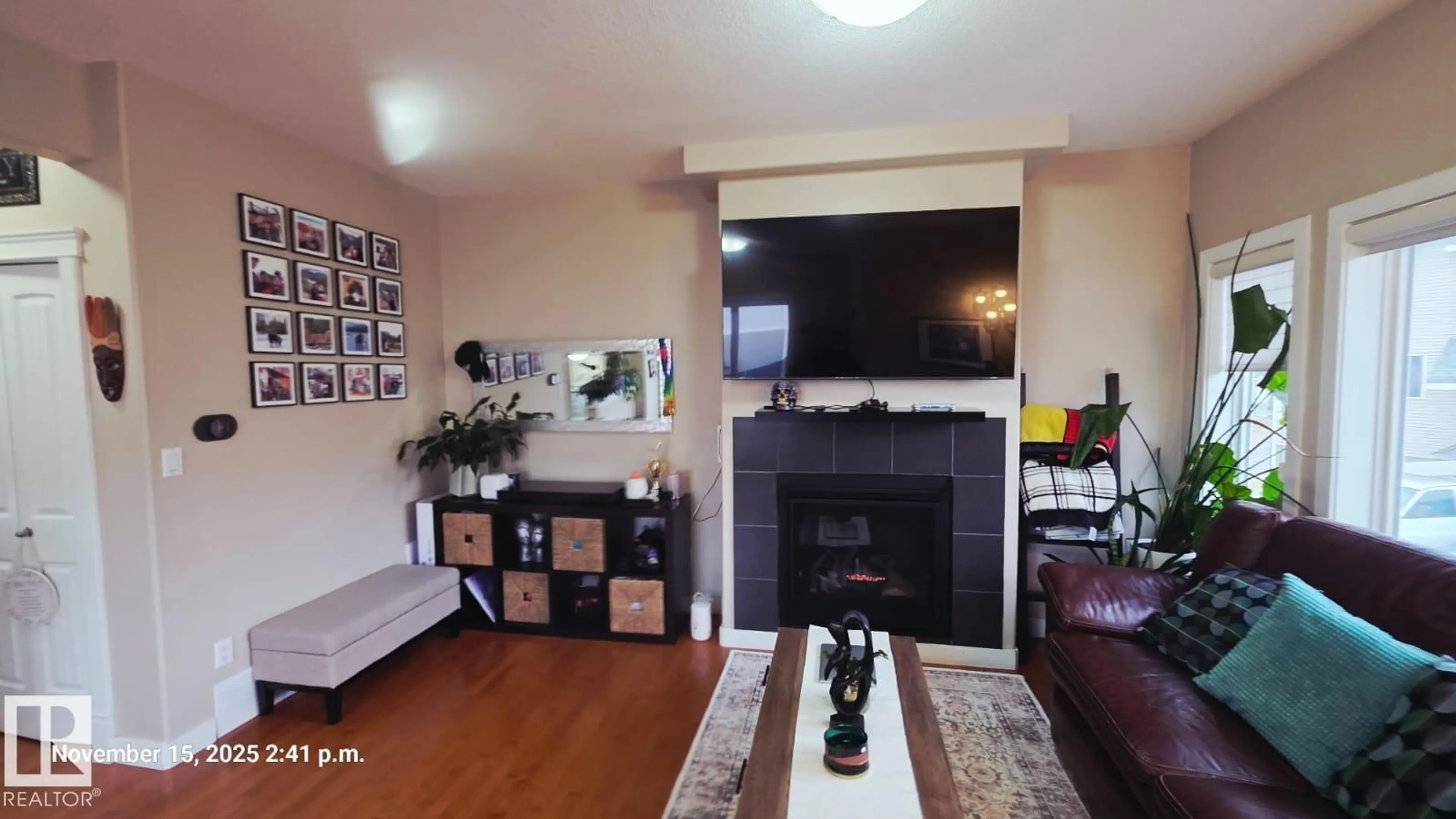 Living room with furniture, wood/laminate floor for #7 - 13215 153 AV, Edmonton Alberta T6V0B6