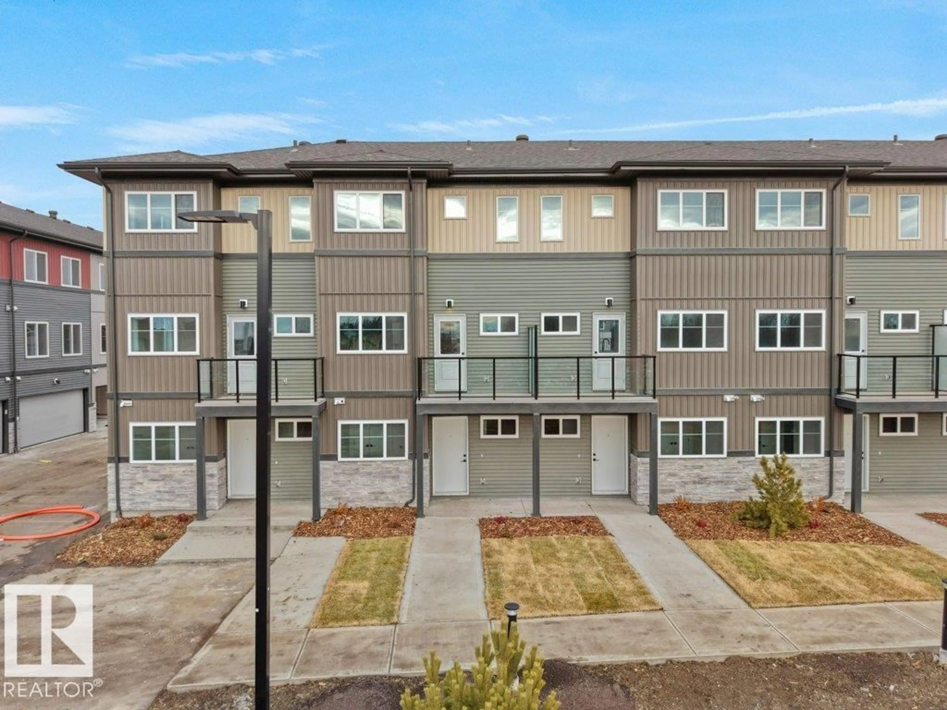 A pic from outside/outdoor area/front of a property/back of a property/a pic from drone, street for 67 18120 28 AV SW, Edmonton Alberta T6W4V2