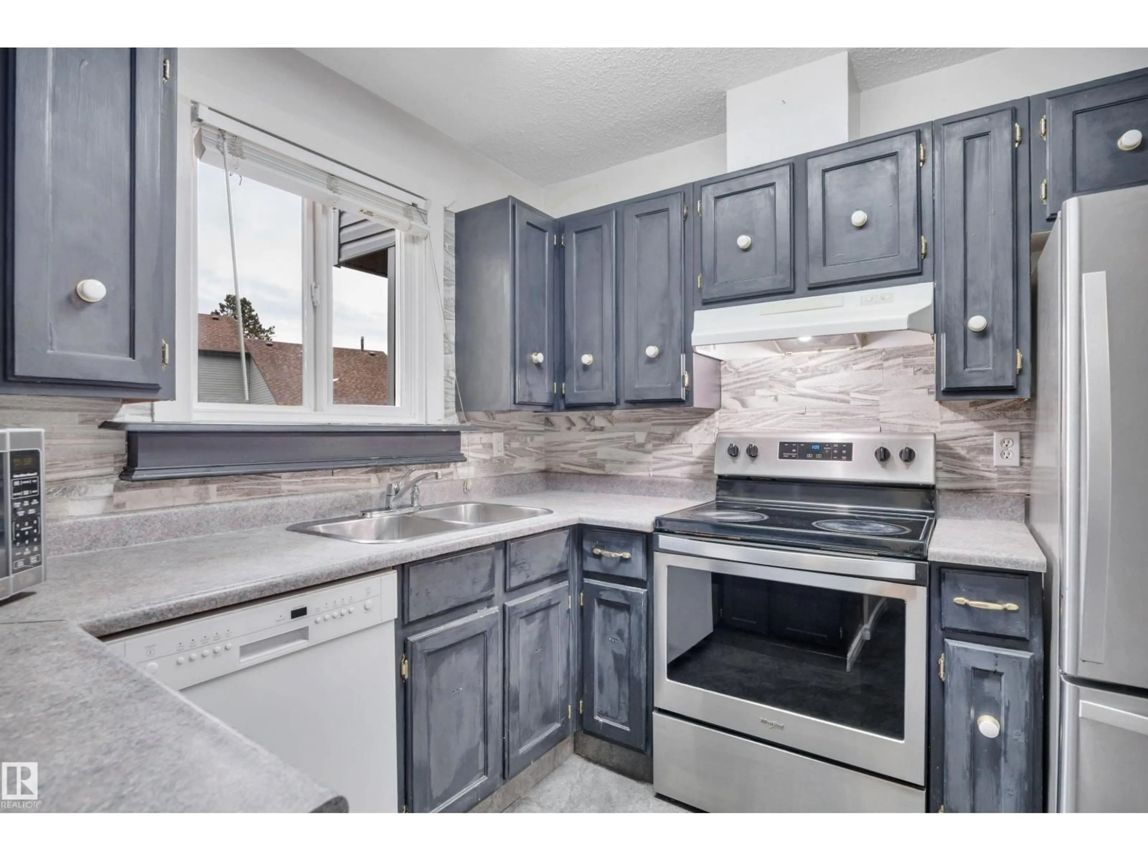 Standard kitchen, ceramic/tile floor for 2416 104 ST, Edmonton Alberta T6J4J8