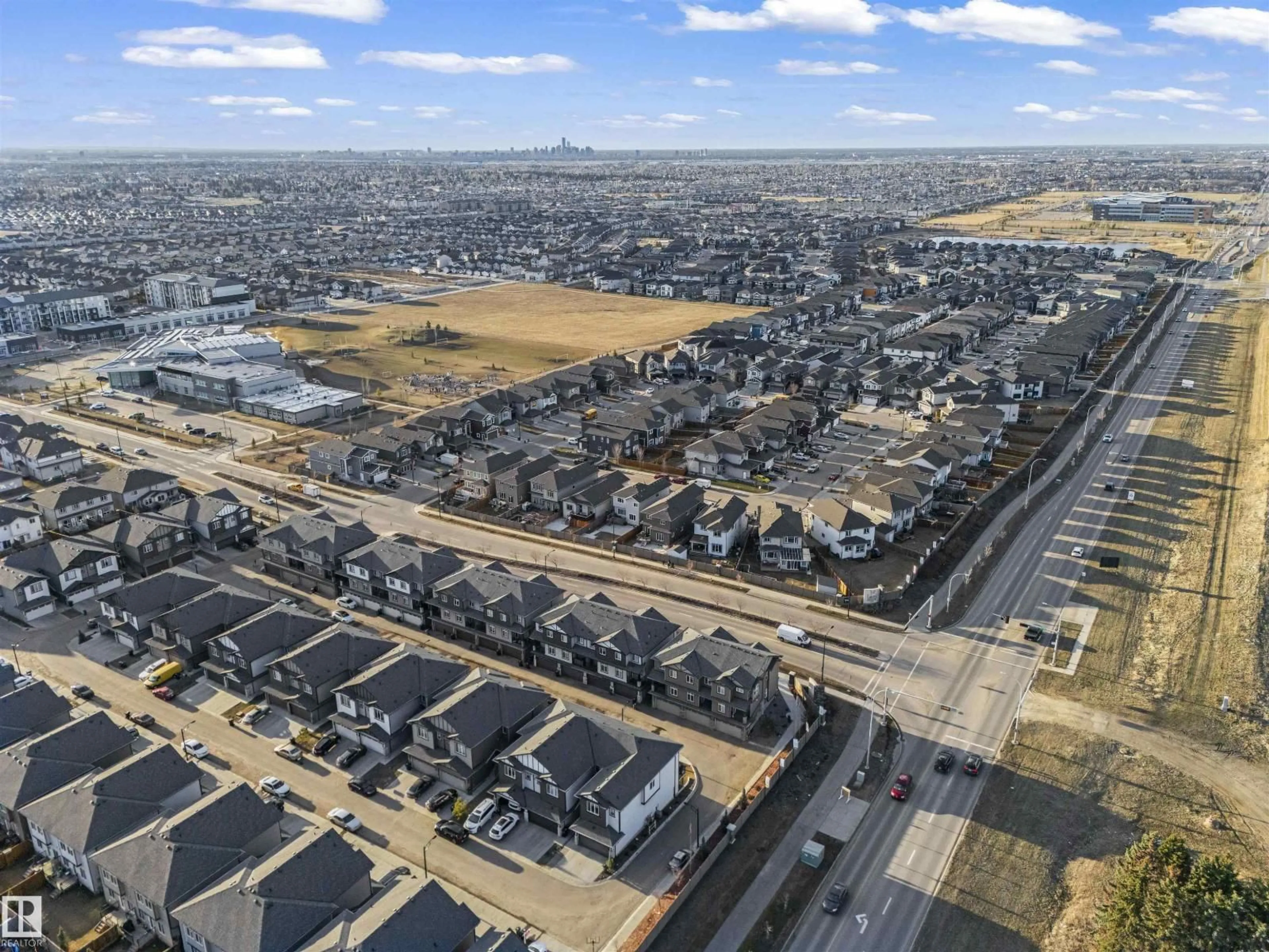 A pic from outside/outdoor area/front of a property/back of a property/a pic from drone, street for #2 - 1703 16 AV, Edmonton Alberta T6T2C3