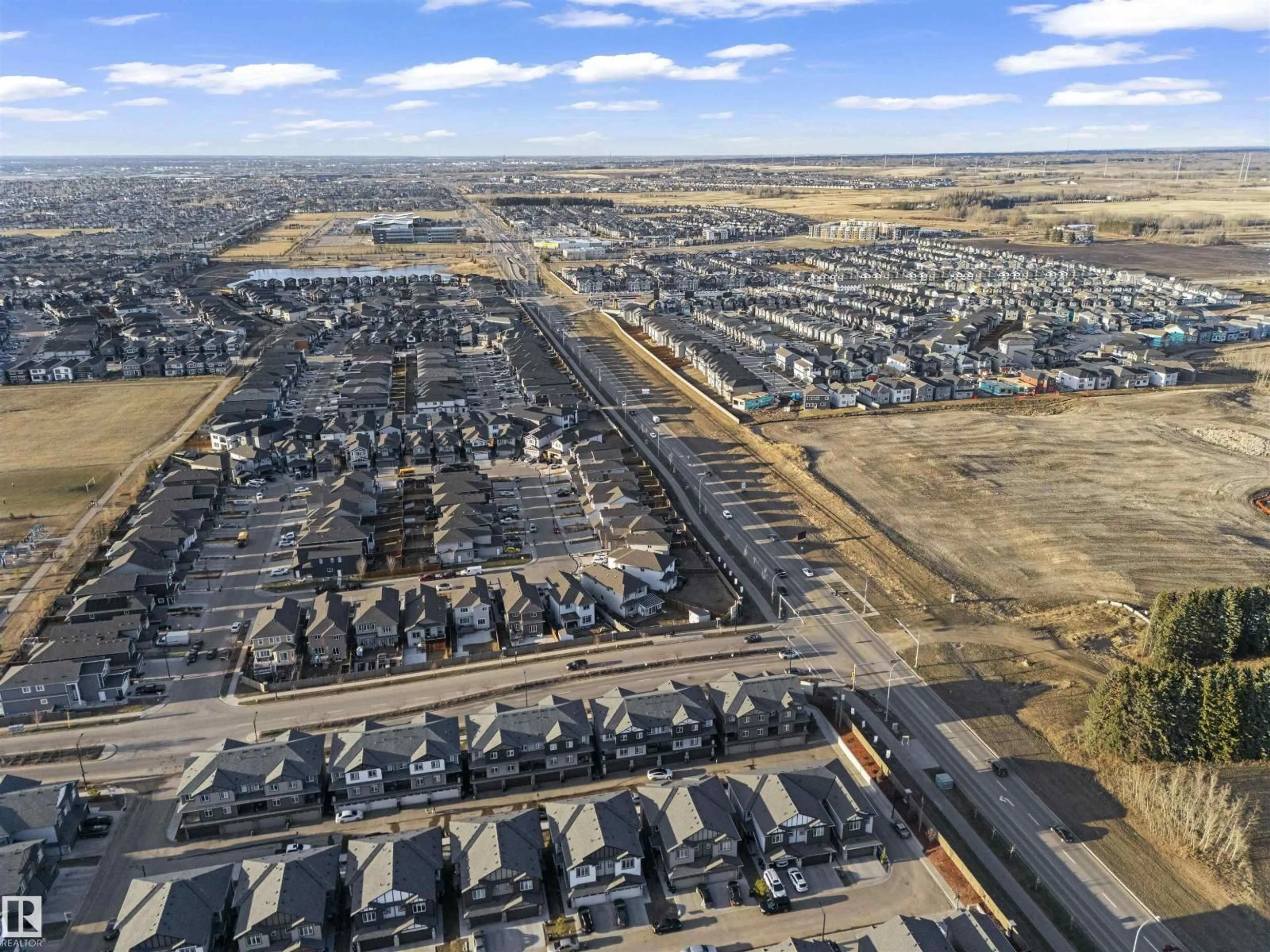 A pic from outside/outdoor area/front of a property/back of a property/a pic from drone, street for #2 - 1703 16 AV, Edmonton Alberta T6T2C3