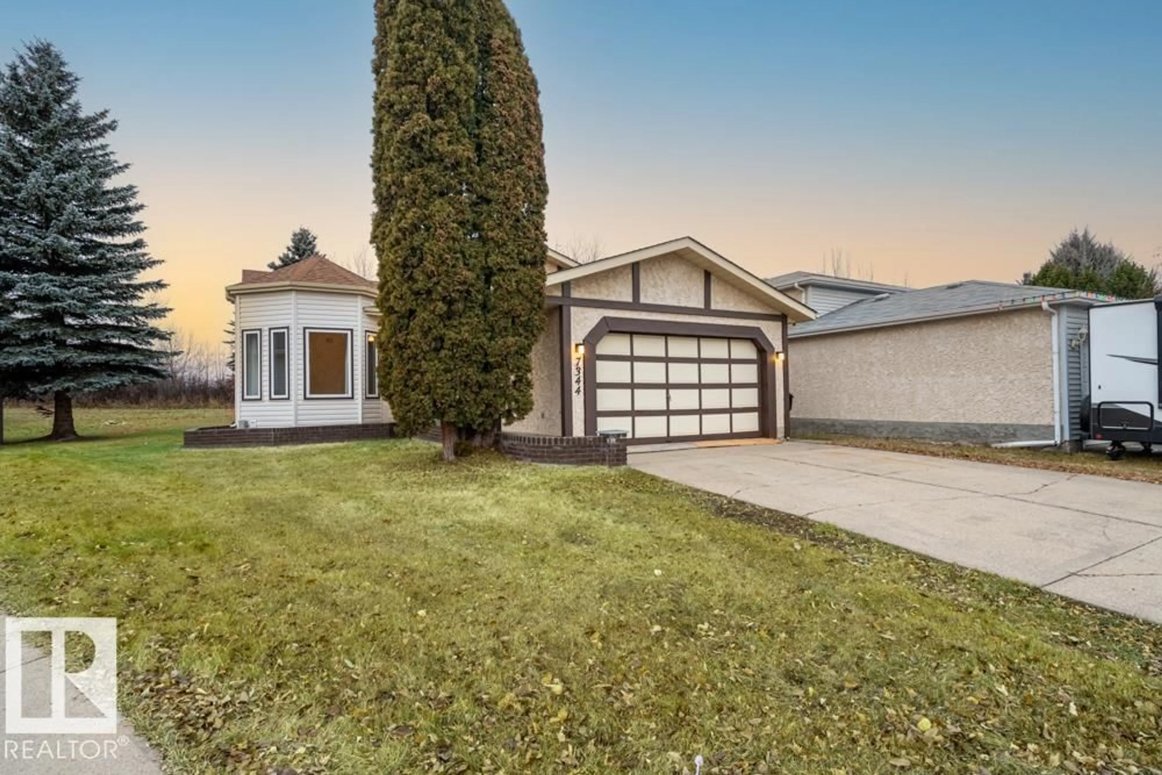 Home with vinyl exterior material, street for NW - 7344 190A ST, Edmonton Alberta T5T5T2