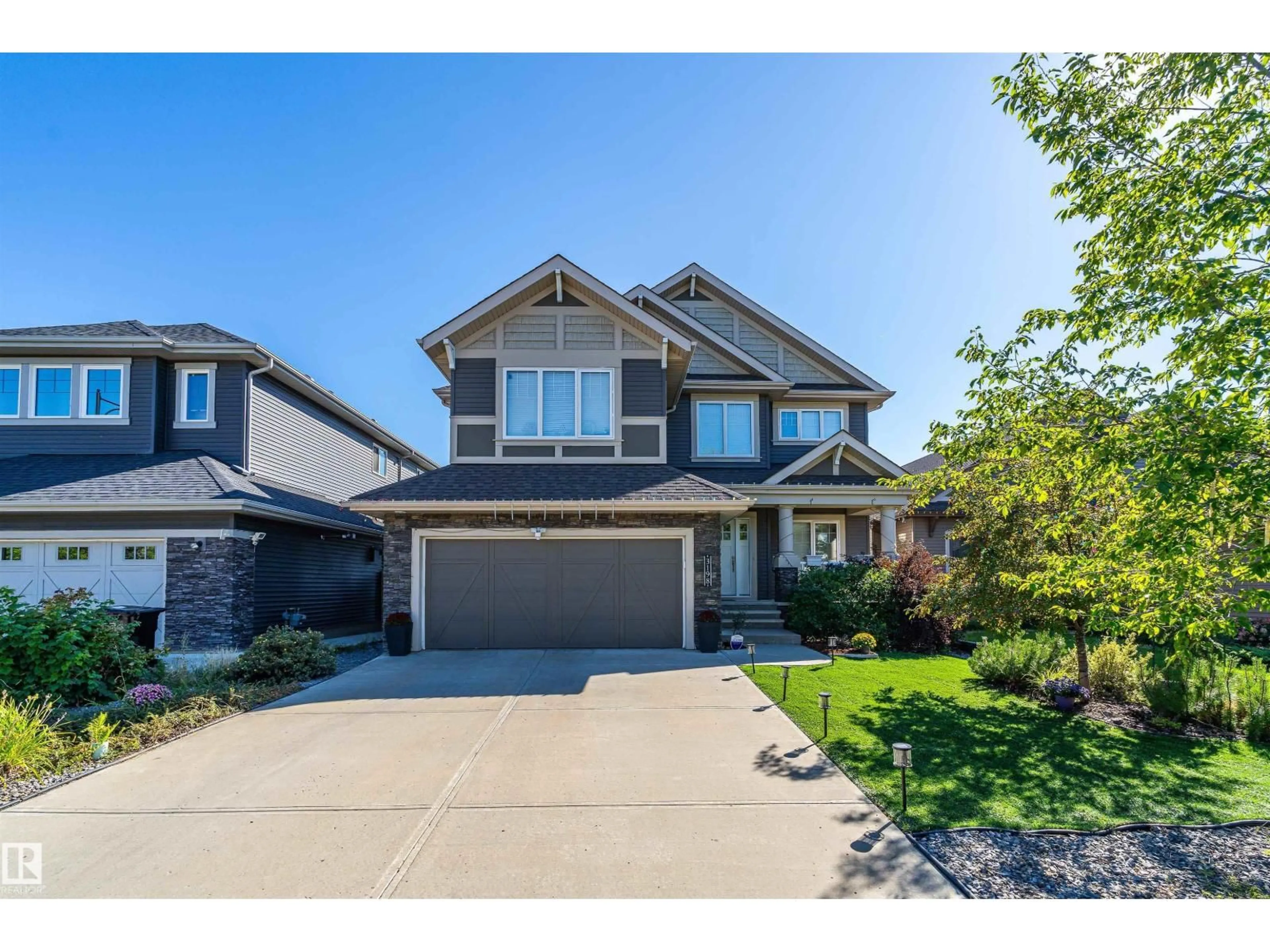 Home with brick exterior material, street for 3198 WINSPEAR CR, Edmonton Alberta T6X1S7