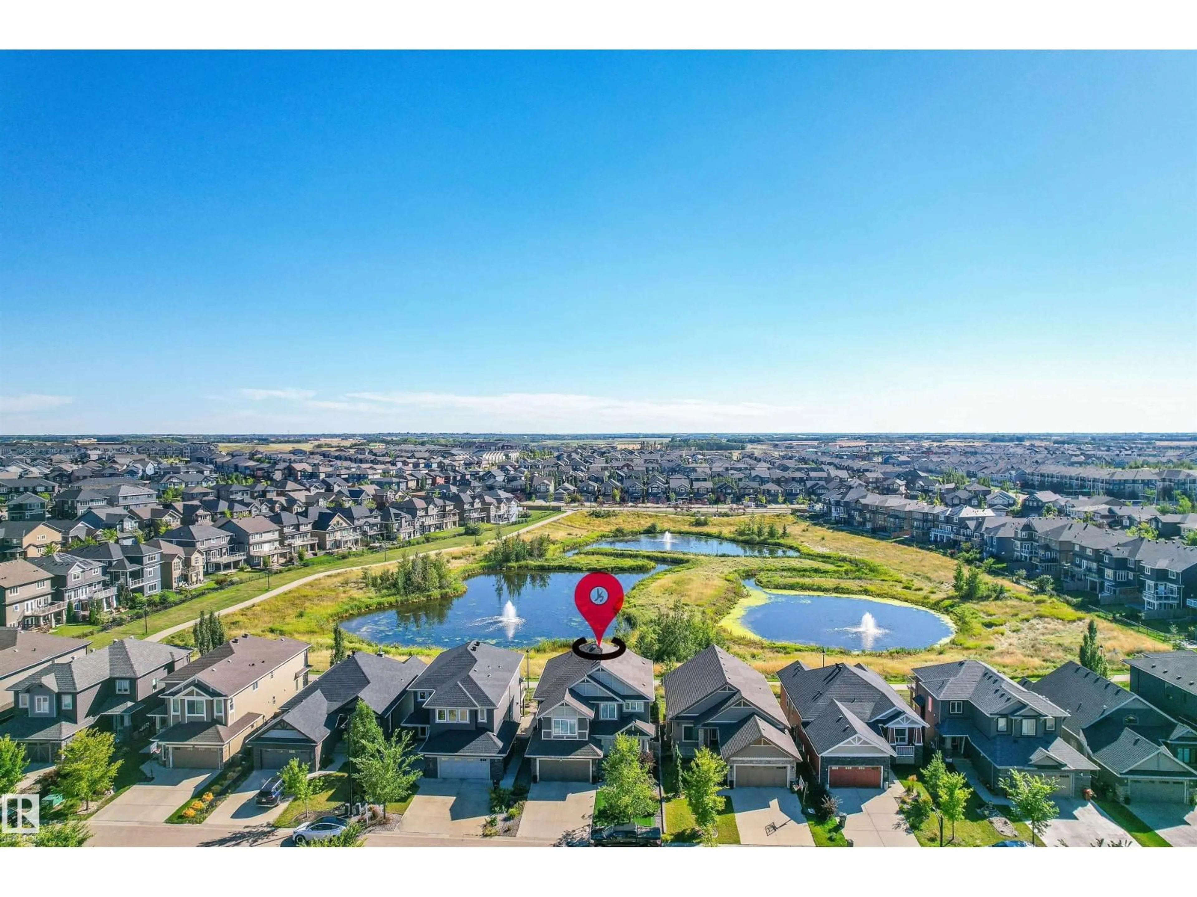 A pic from outside/outdoor area/front of a property/back of a property/a pic from drone, water/lake/river/ocean view for 3198 WINSPEAR CR, Edmonton Alberta T6X1S7