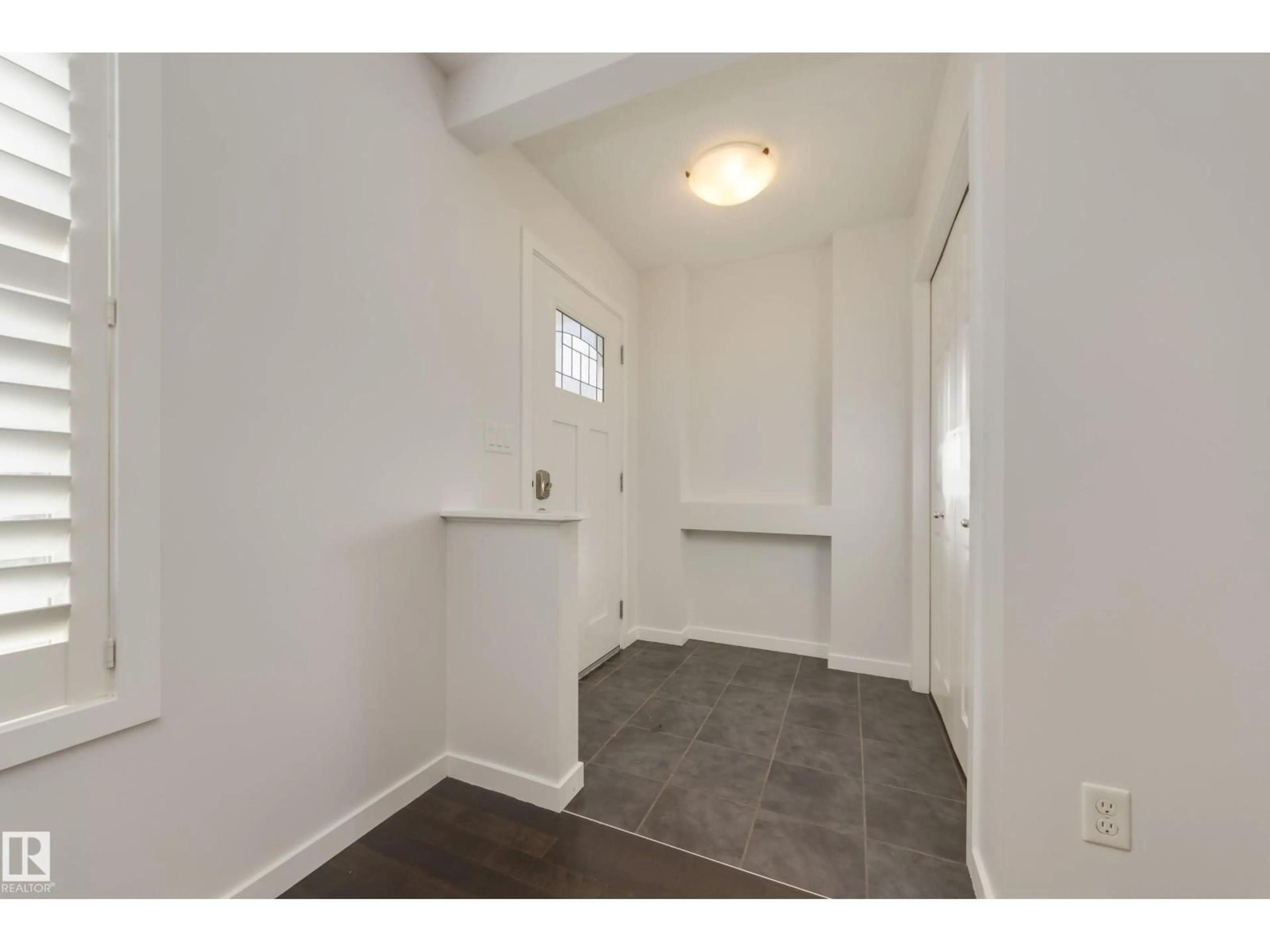 Indoor entryway for SW - 7408 15A AV, Edmonton Alberta T6X0E1