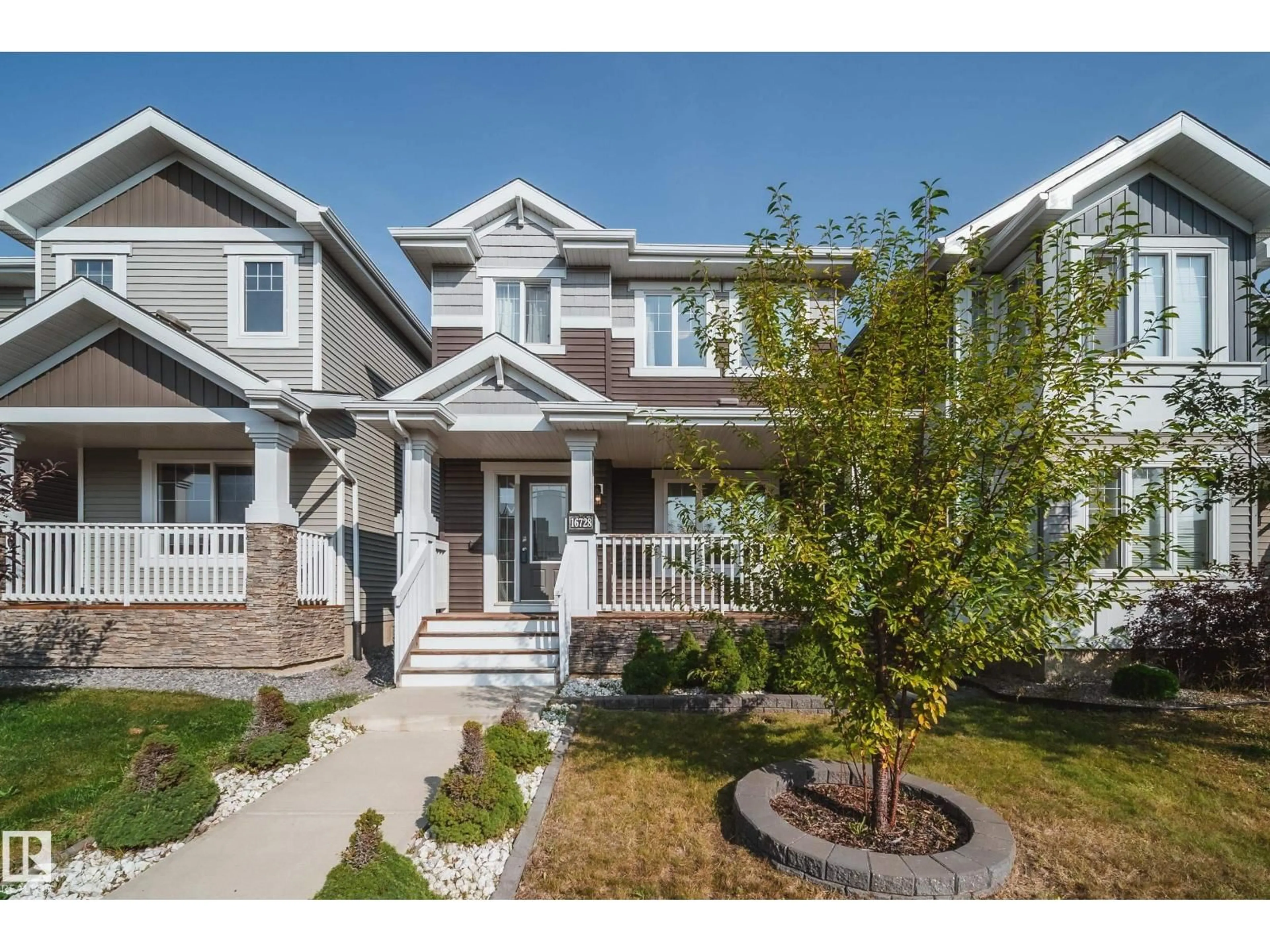 Home with vinyl exterior material, street for SW - 16728 15 AV, Edmonton Alberta T6W3R6