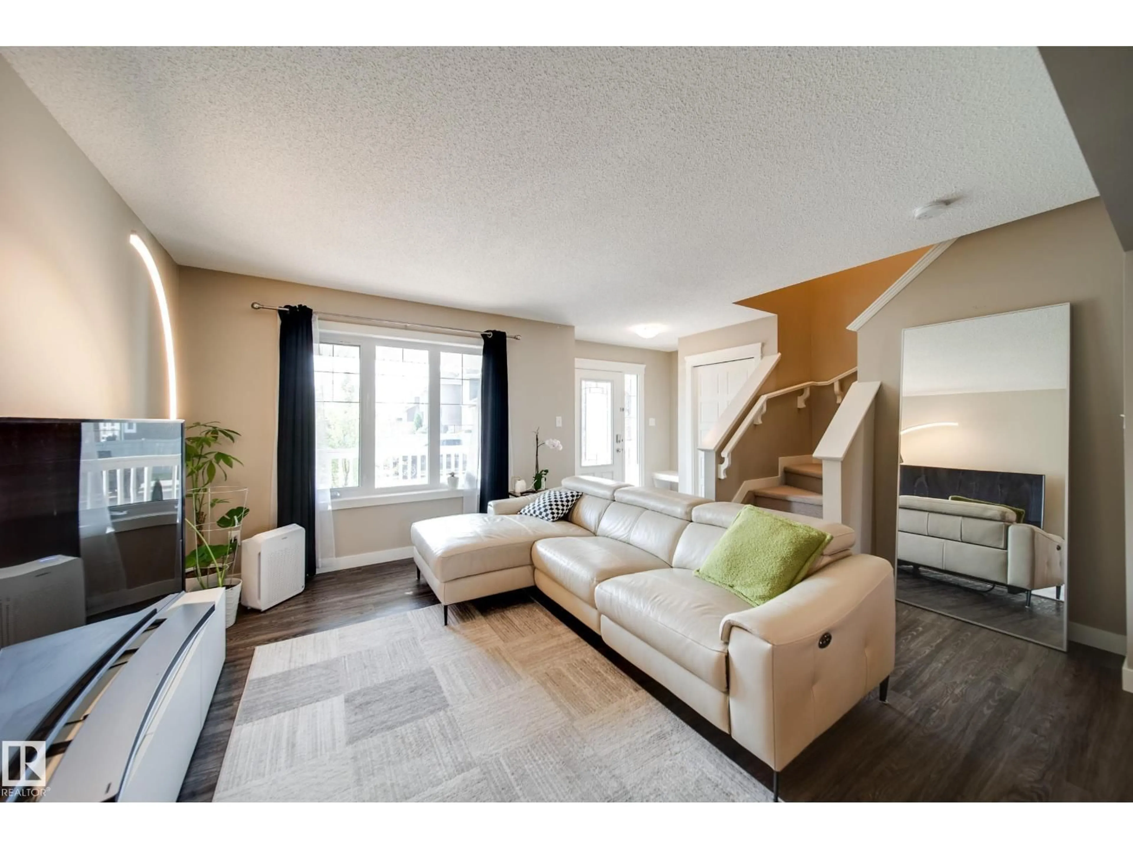 Living room with furniture, unknown for SW - 16728 15 AV, Edmonton Alberta T6W3R6