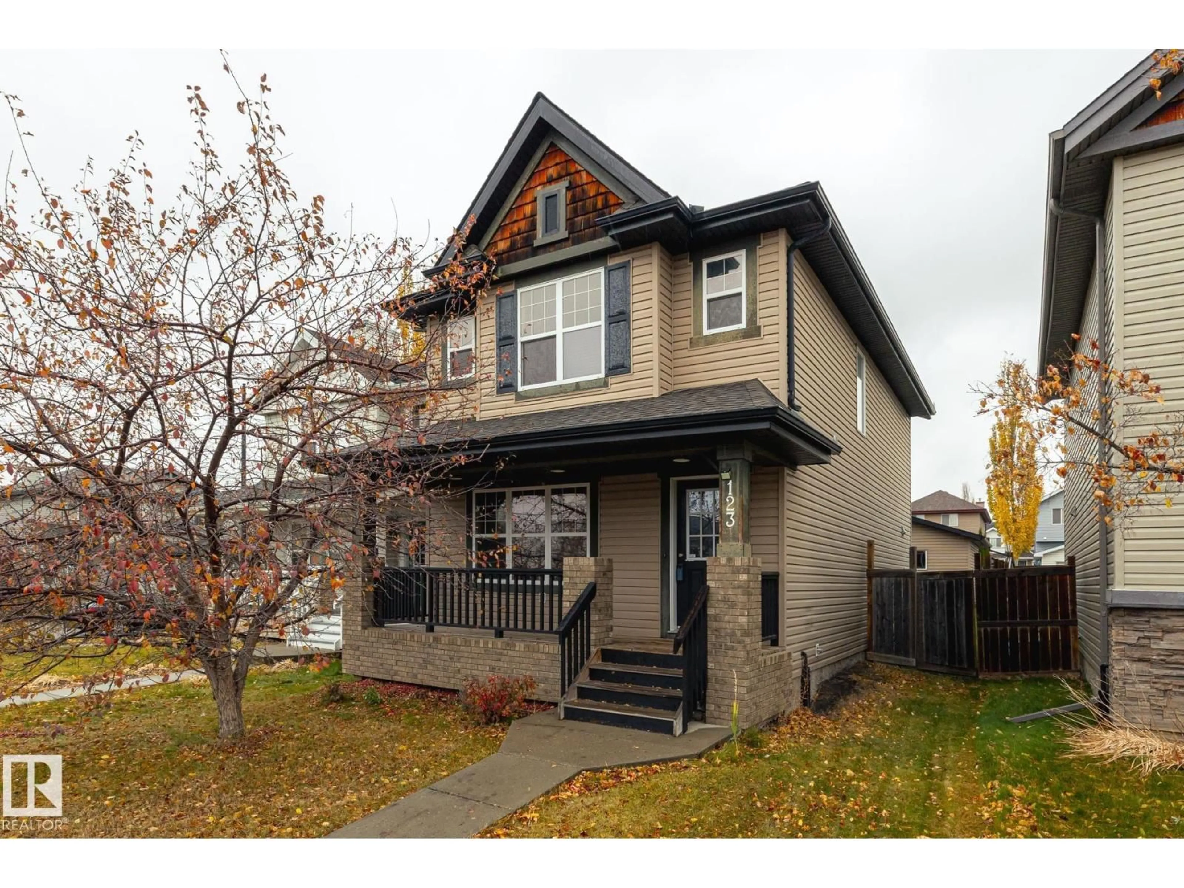 Home with vinyl exterior material, street for 123 63 ST, Edmonton Alberta T6X0C1
