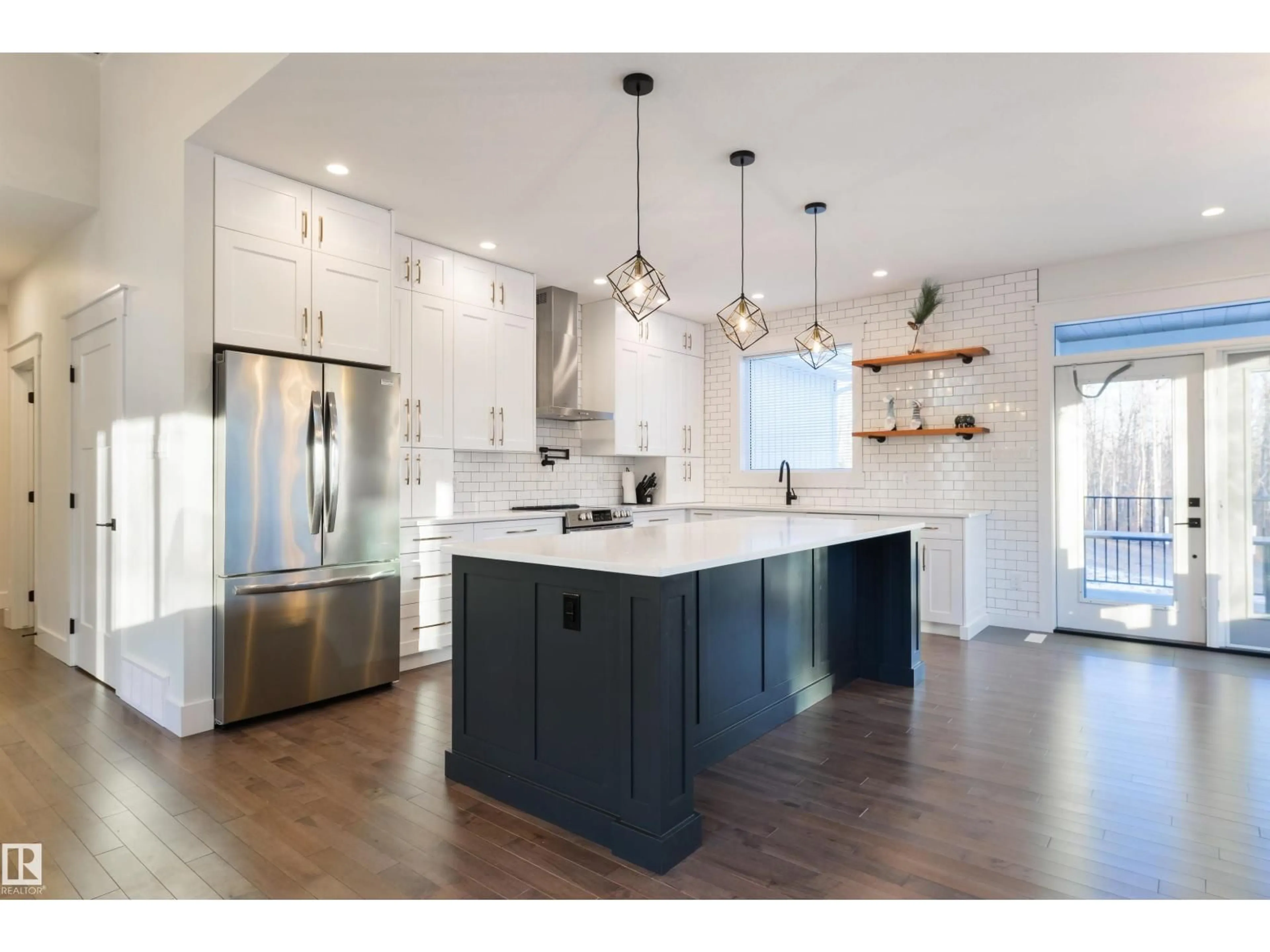 Open concept kitchen, wood/laminate floor for #14 - 2406 TWP ROAD 540, Rural Lac Ste. Anne County Alberta T0E1V0