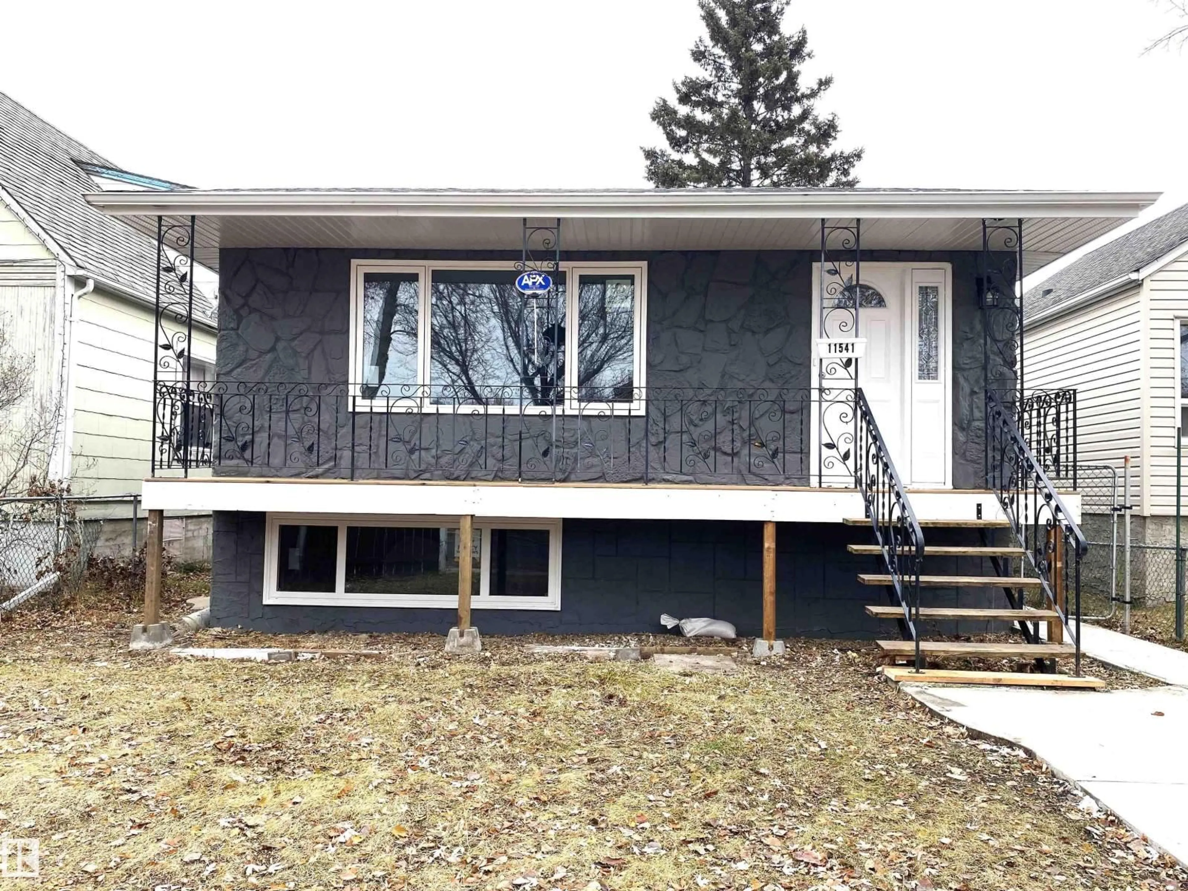 Home with vinyl exterior material, street for 11541 93 ST, Edmonton Alberta T5G1C6